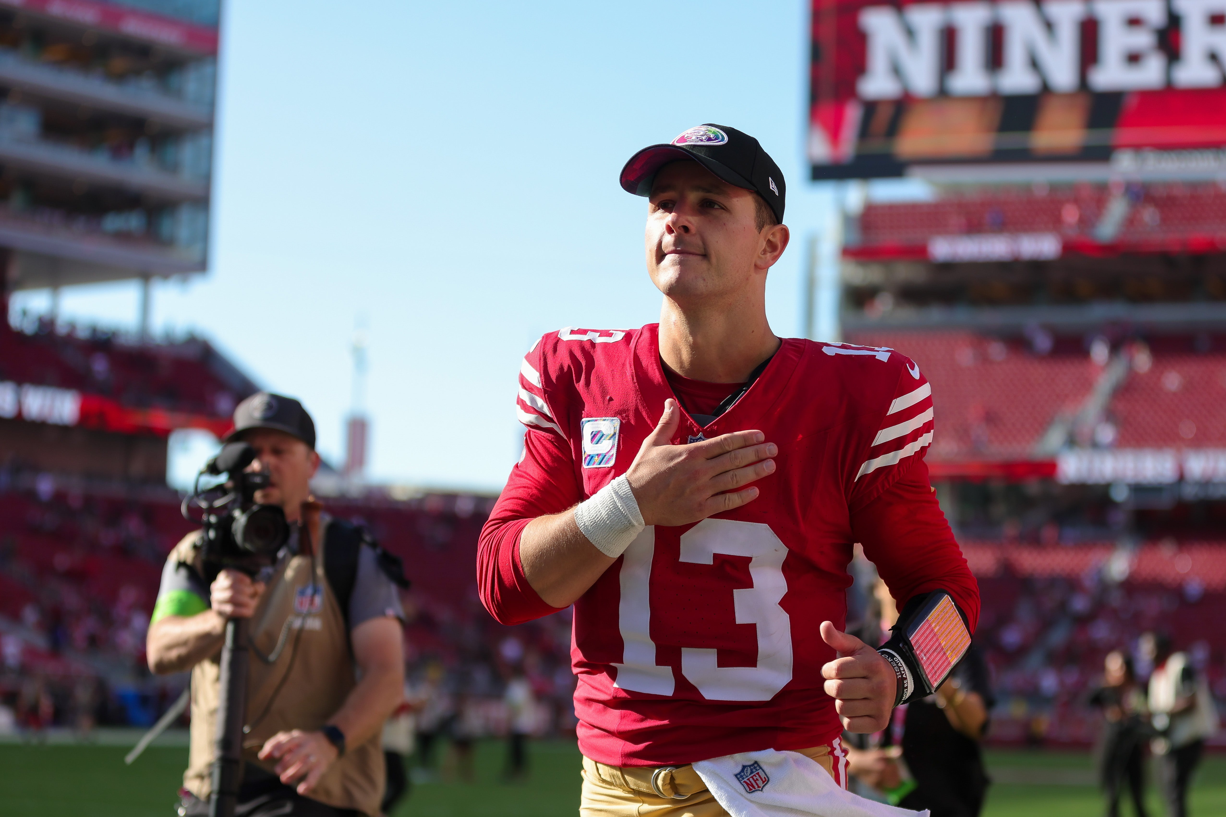 Oct 1, 2023; Santa Clara, California, USA; San Francisco 49ers quarterback Brock Purdy (13) runs off the field after the game against the Arizona Cardinals at Levi's Stadium.