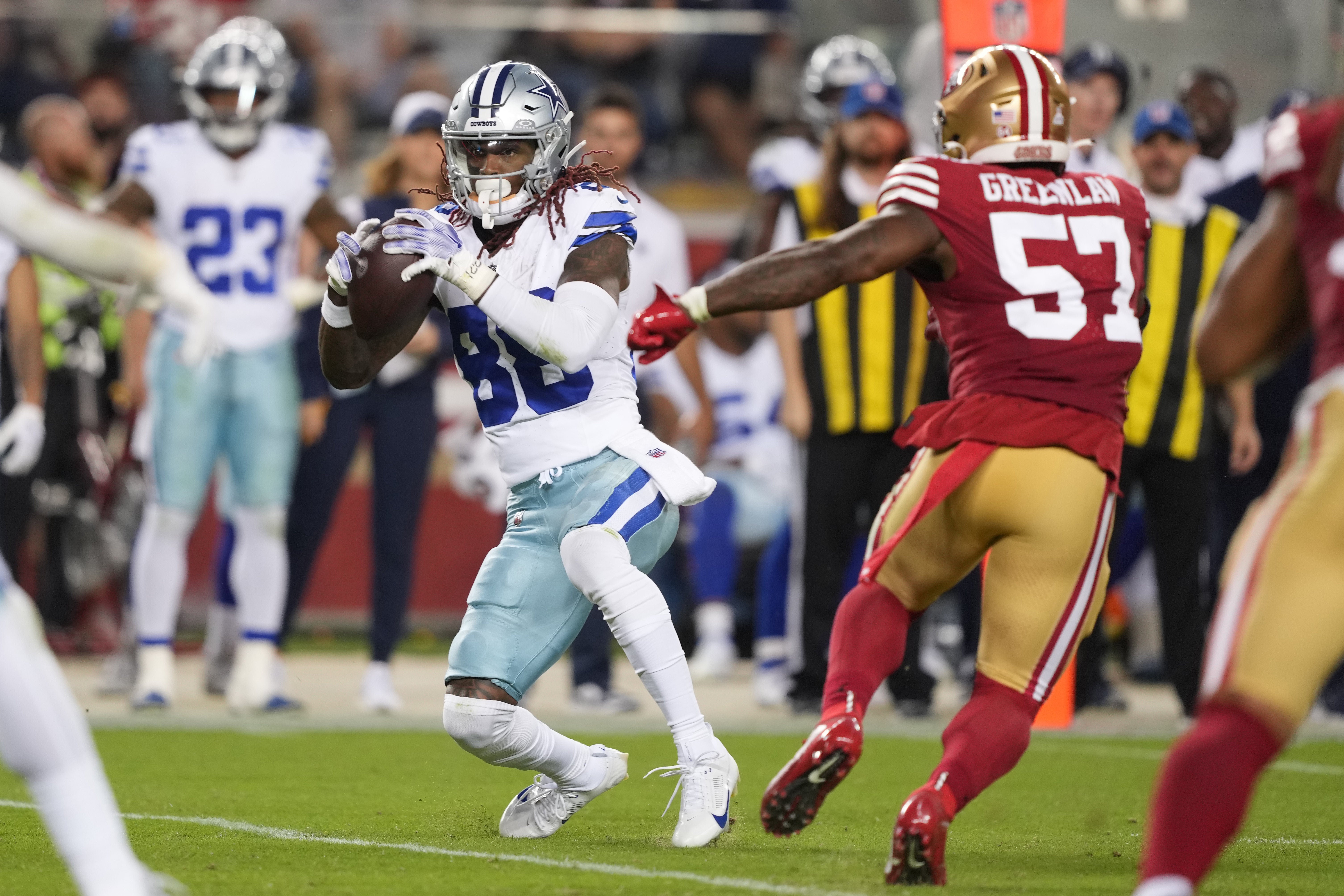 Dallas Cowboys wide receiver CeeDee Lamb (88) catches a pass against San Francisco 49ers linebacker Dre Greenlaw (57) during the third quarter at Levi's Stadium. Mandatory Credit: Darren Yamashita-USA TODAY Sports