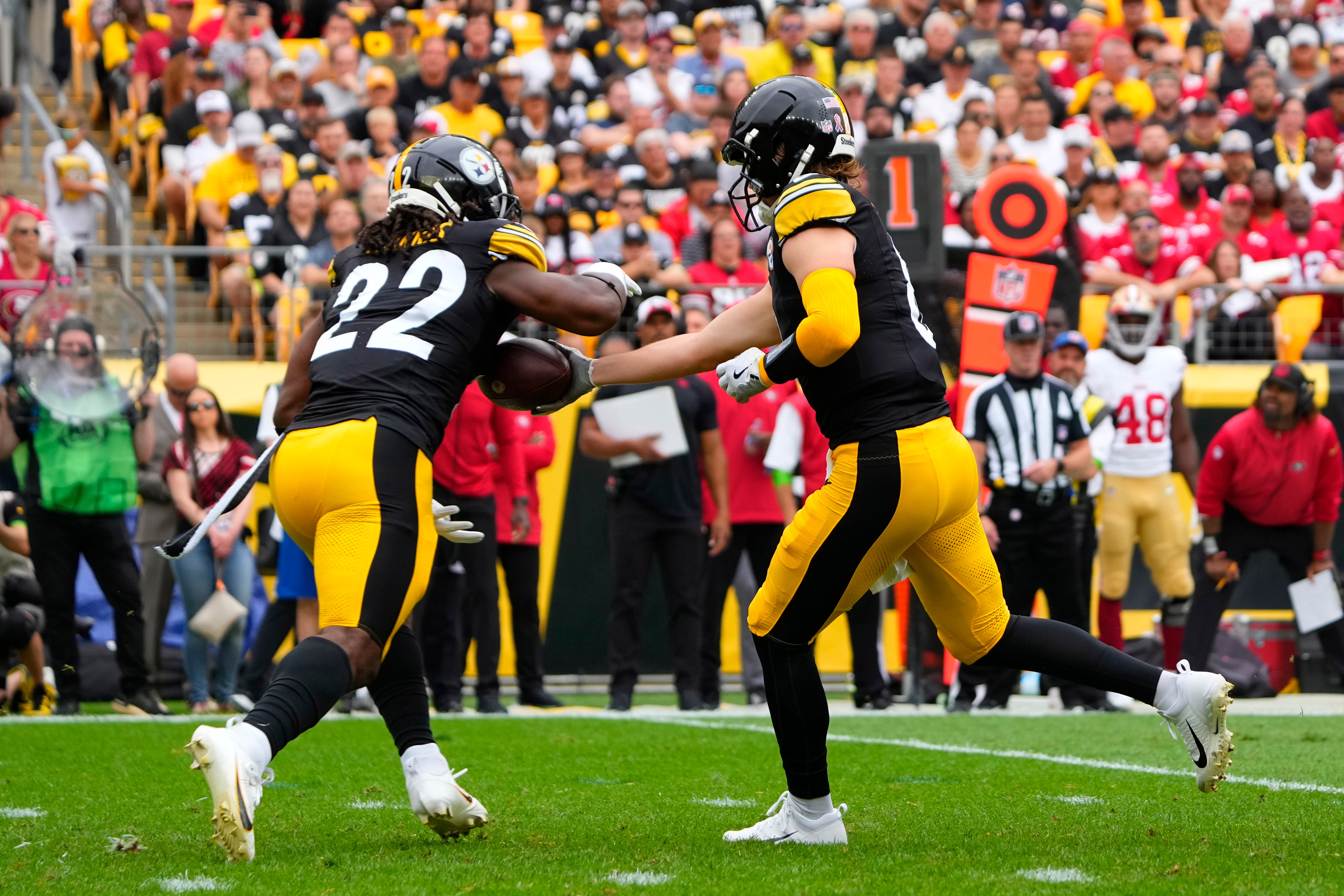 Sep 10, 2023; Pittsburgh, Pennsylvania, USA; Pittsburgh Steelers quarterback Kenny Pickett (8) hands the ball off to Pittsburgh Steelers running back Najee Harris (22) during the first half against the San Francisco 49ers at Acrisure Stadium. Mandatory Credit: Gregory Fisher-USA TODAY Sports
