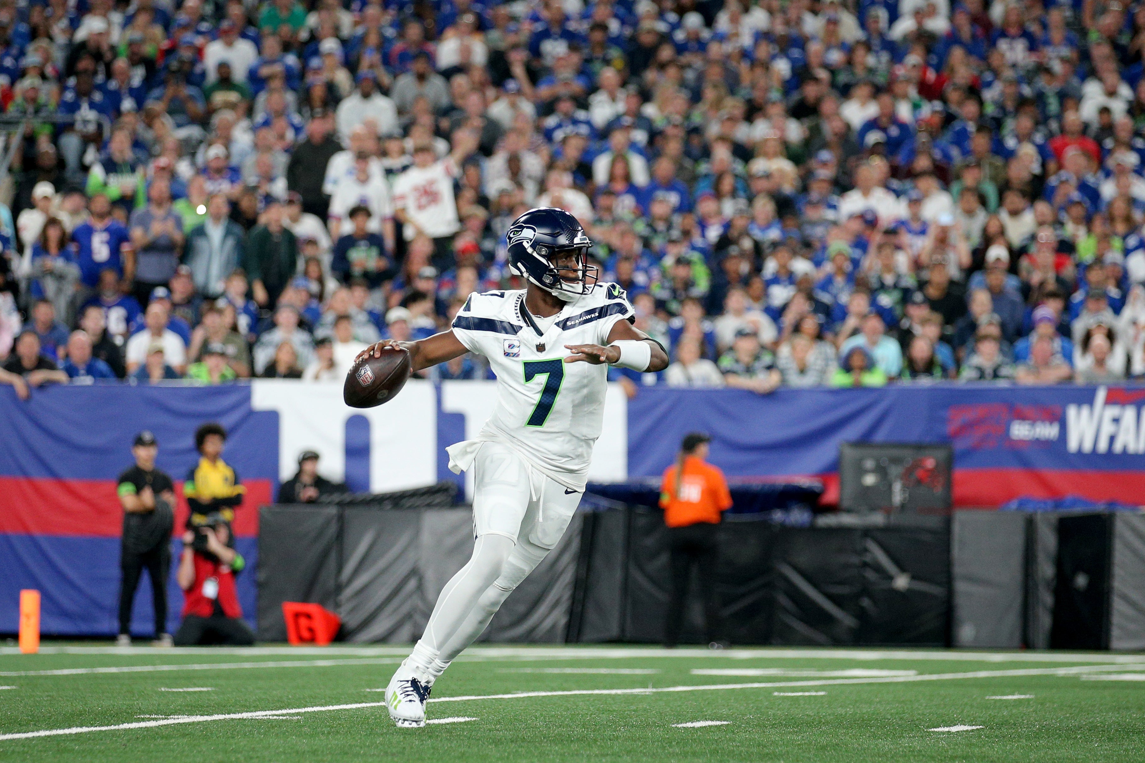 Oct 2, 2023; East Rutherford, New Jersey, USA; Seattle Seahawks quarterback Geno Smith (7) drops back to pass against the New York Giants during the first quarter at MetLife Stadium. Mandatory Credit: Brad Penner-USA TODAY Sports