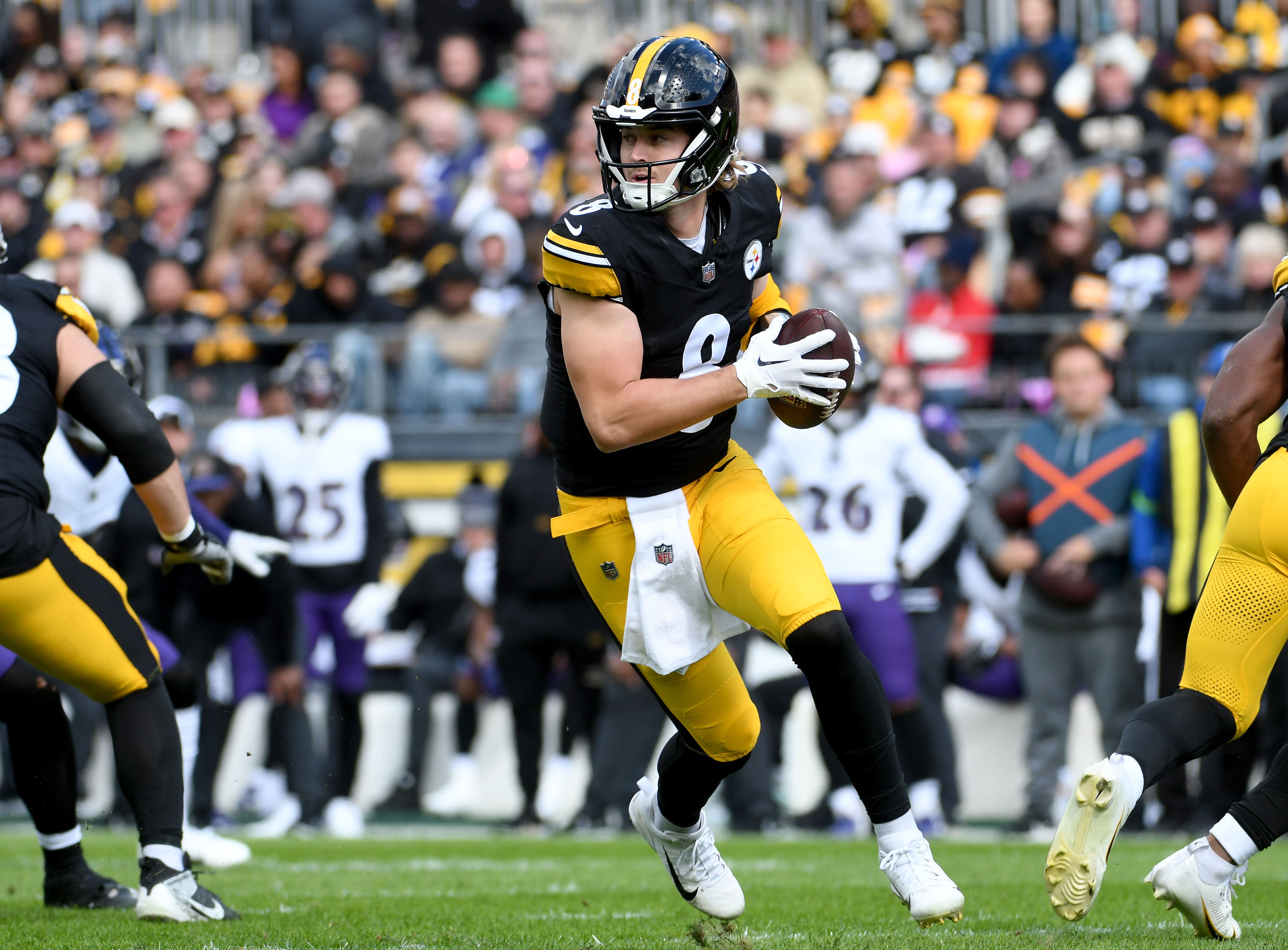 Oct 8, 2023; Pittsburgh, Pennsylvania, USA; Pittsburgh Steelers quarterback Kenny Pickett (8) against the Baltimore Ravens during the first quarter at Acrisure Stadium. Mandatory Credit: Philip G. Pavely-USA TODAY Sports  