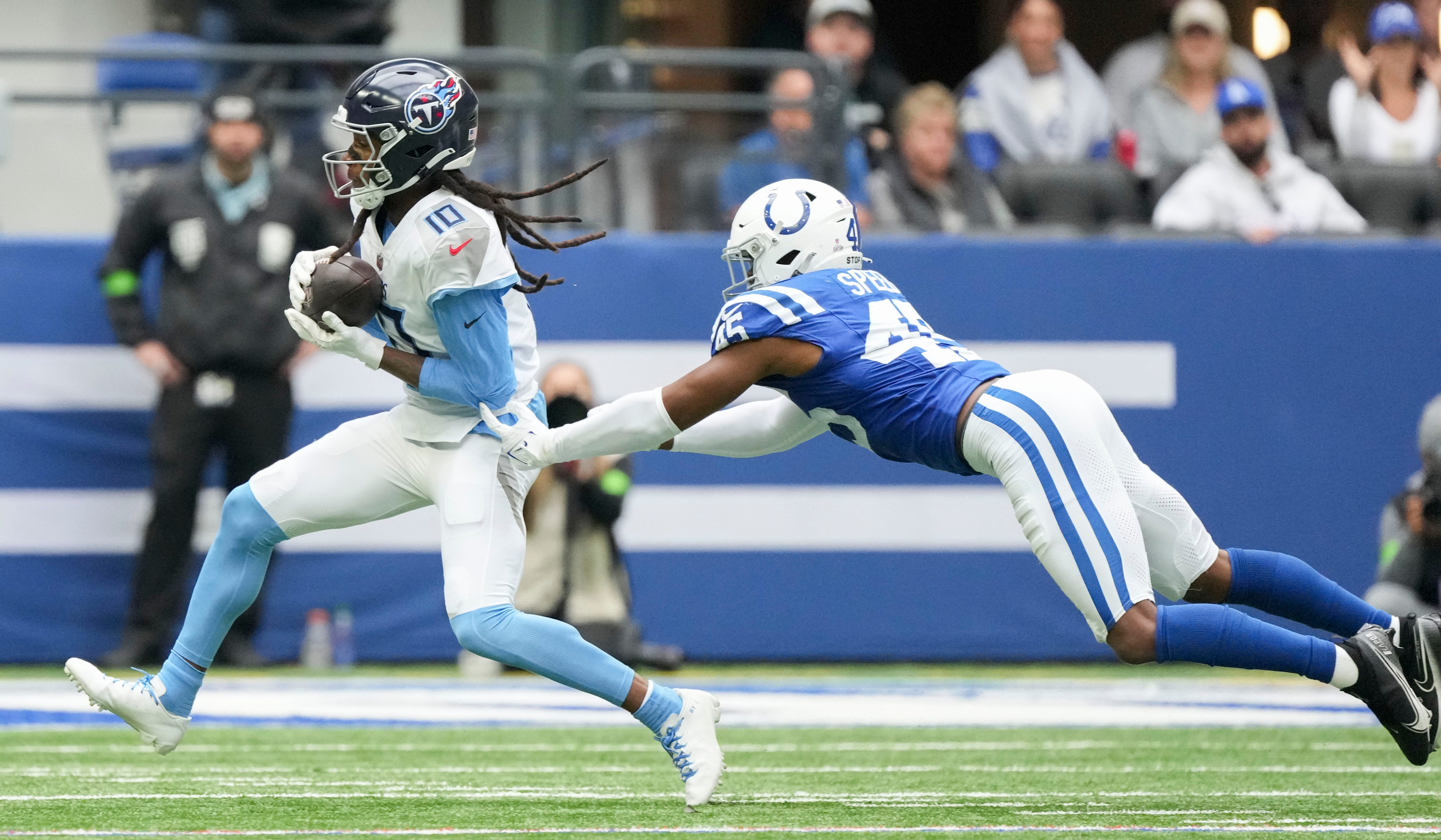 Tennessee Titans wide receiver DeAndre Hopkins (10) as he rushes the ball Sunday, Oct. 8, 2023, during a game against the Tennessee Titans at Lucas Oil Stadium in Indianapolis.