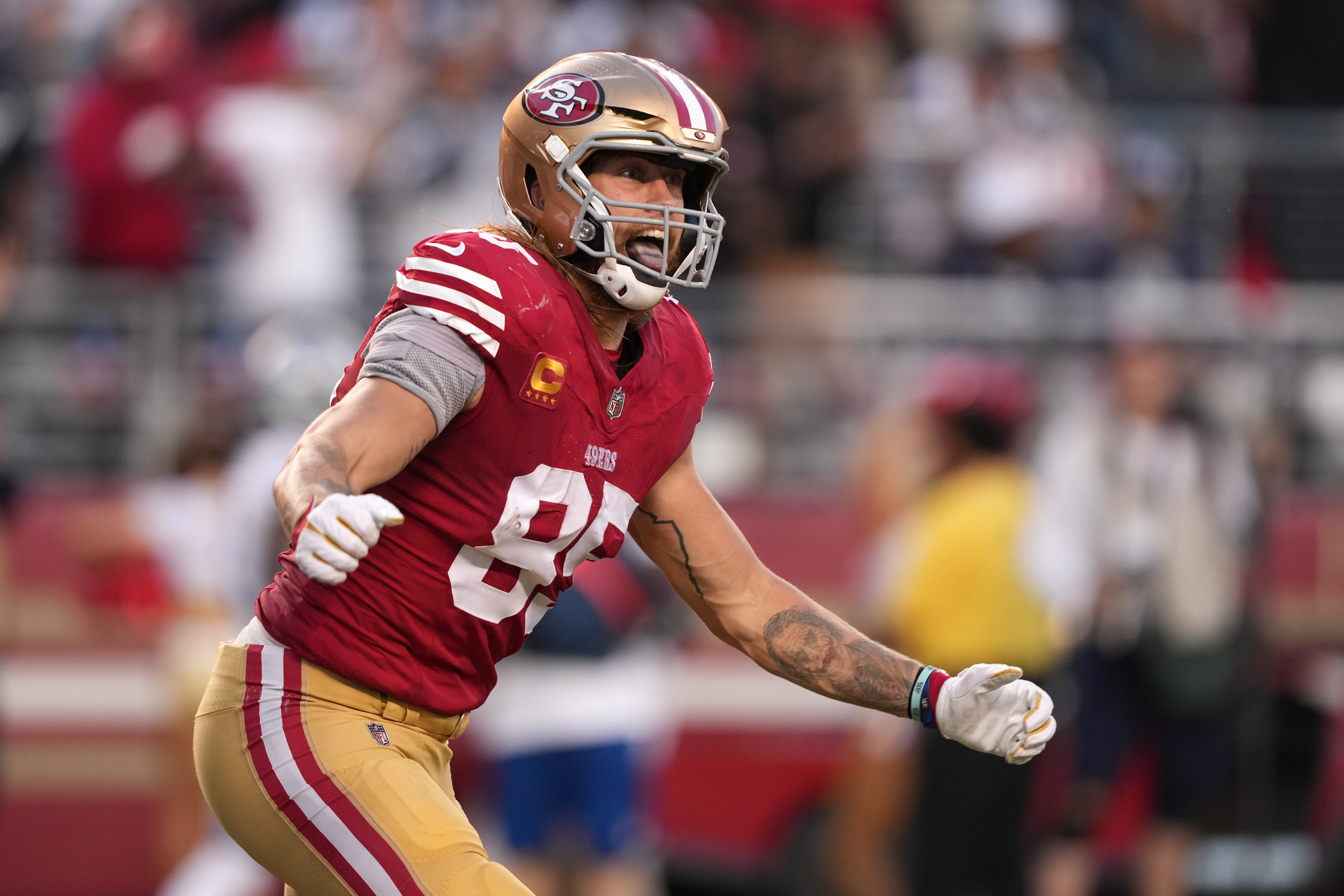 Oct 8, 2023; Santa Clara, California, USA; San Francisco 49ers tight end George Kittle (85) reacts after scoring a touchdown against the Dallas Cowboys during the second quarter at Levi's Stadium.