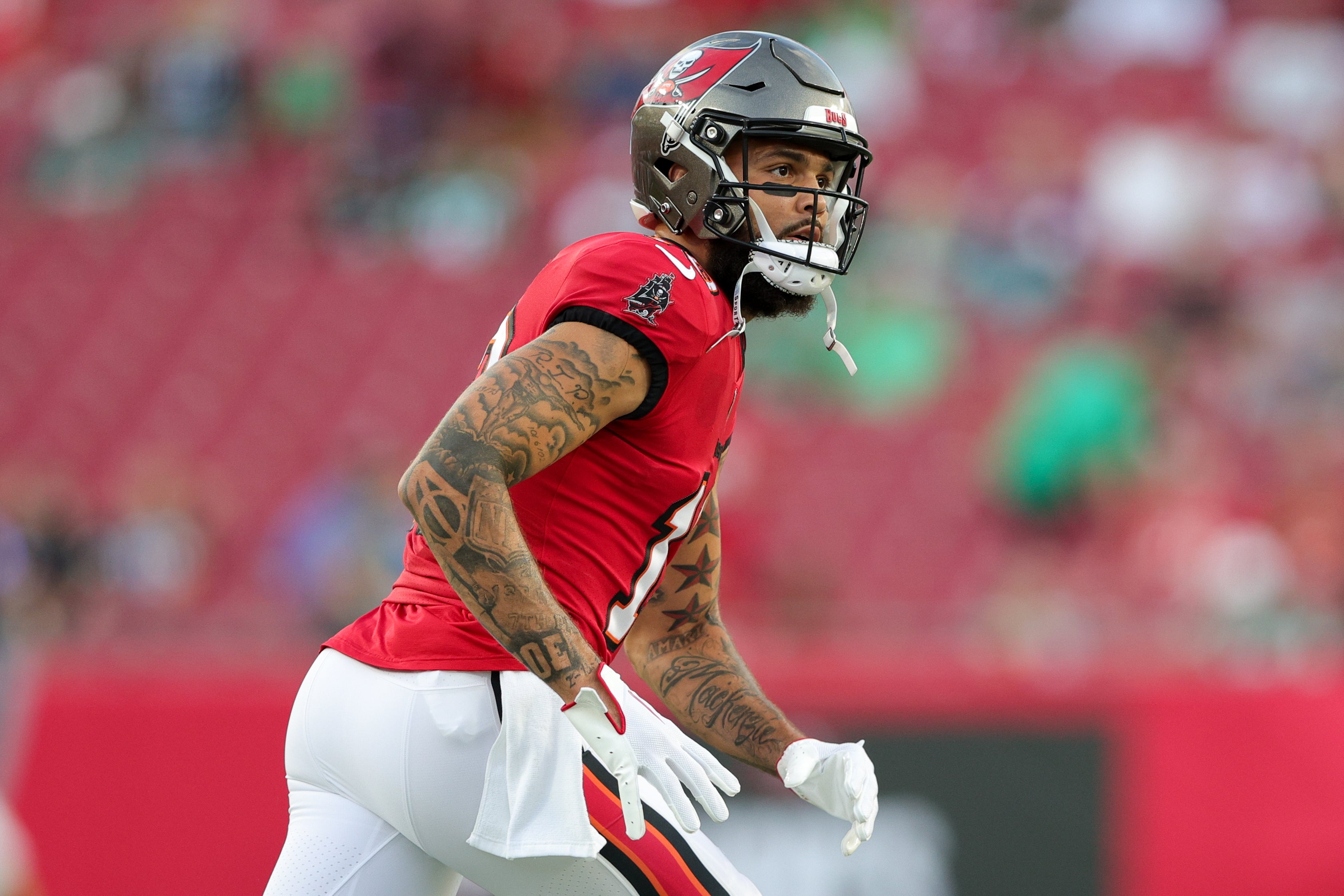 Sep 25, 2023; Tampa, Florida, USA; Tampa Bay Buccaneers wide receiver Mike Evans (13) warms up before a game against the Philadelphia Eagles at Raymond James Stadium. Mandatory Credit: Nathan Ray Seebeck-USA TODAY Sports