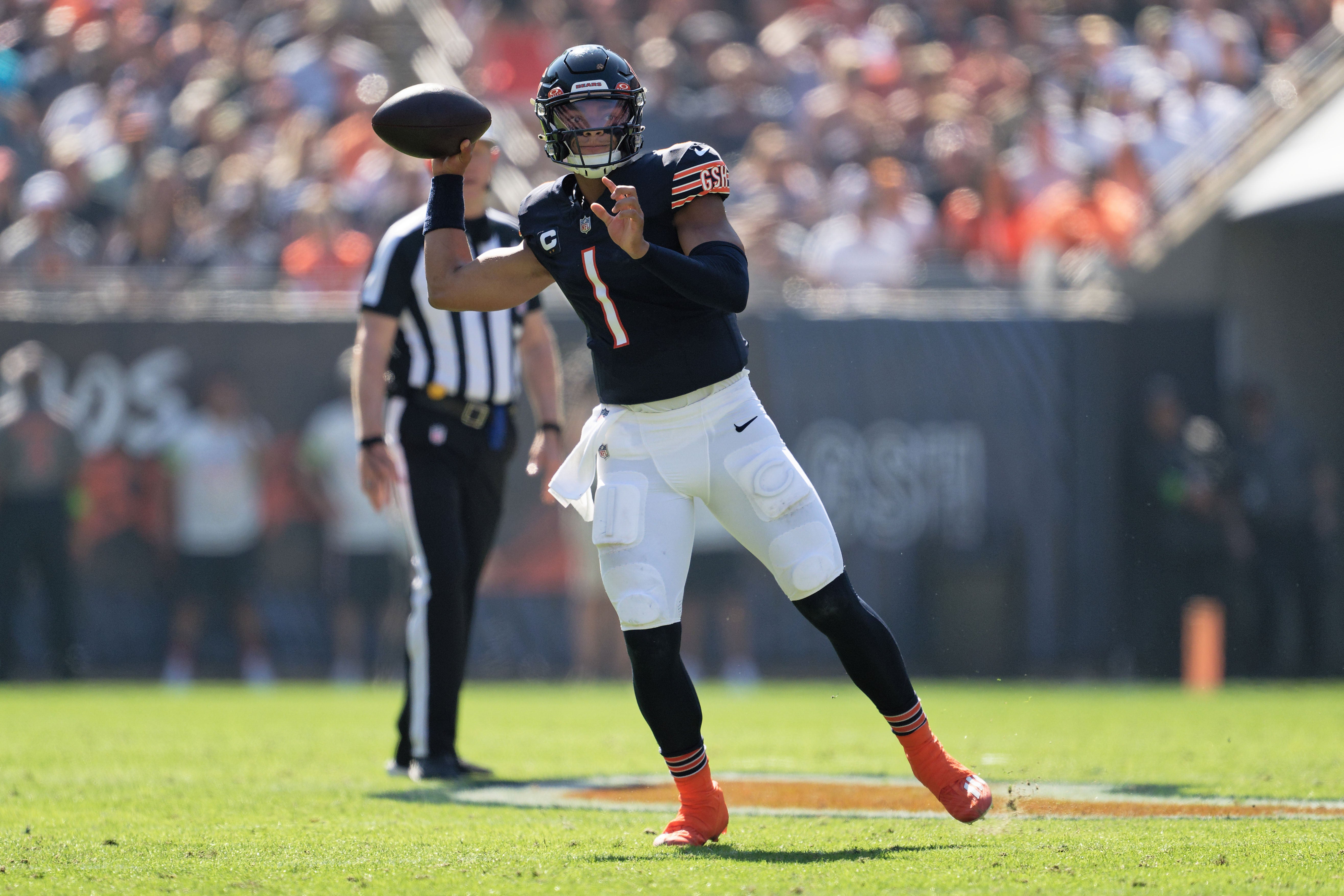 Oct 1, 2023; Chicago, Illinois, USA; Chicago Bears quarterback Justin Fields (1) passes against the Denver Broncos at Soldier Field.