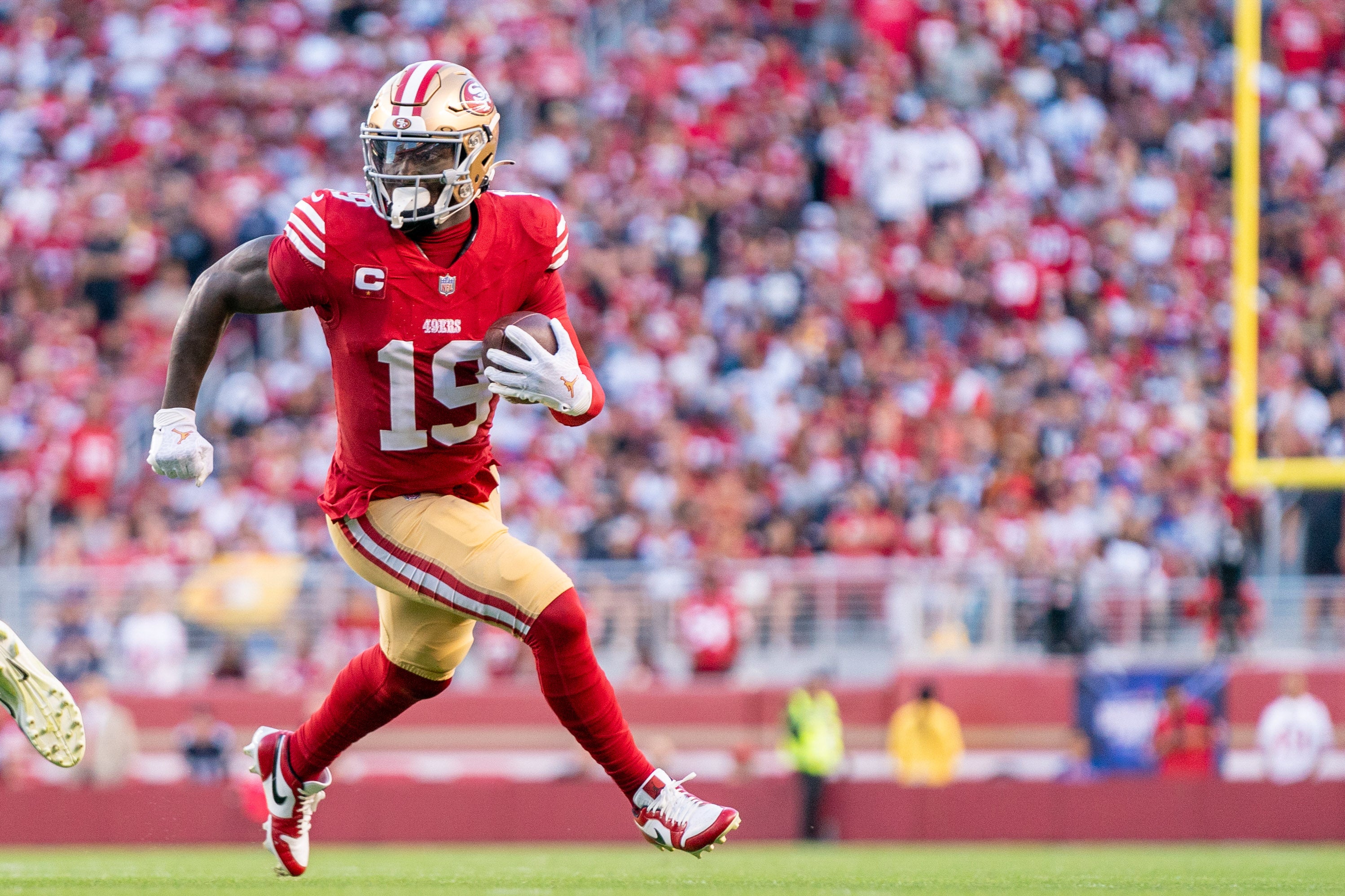 October 8, 2023; Santa Clara, California, USA; San Francisco 49ers wide receiver Deebo Samuel (19) runs the football during the first quarter against the Dallas Cowboys at Levi's Stadium.