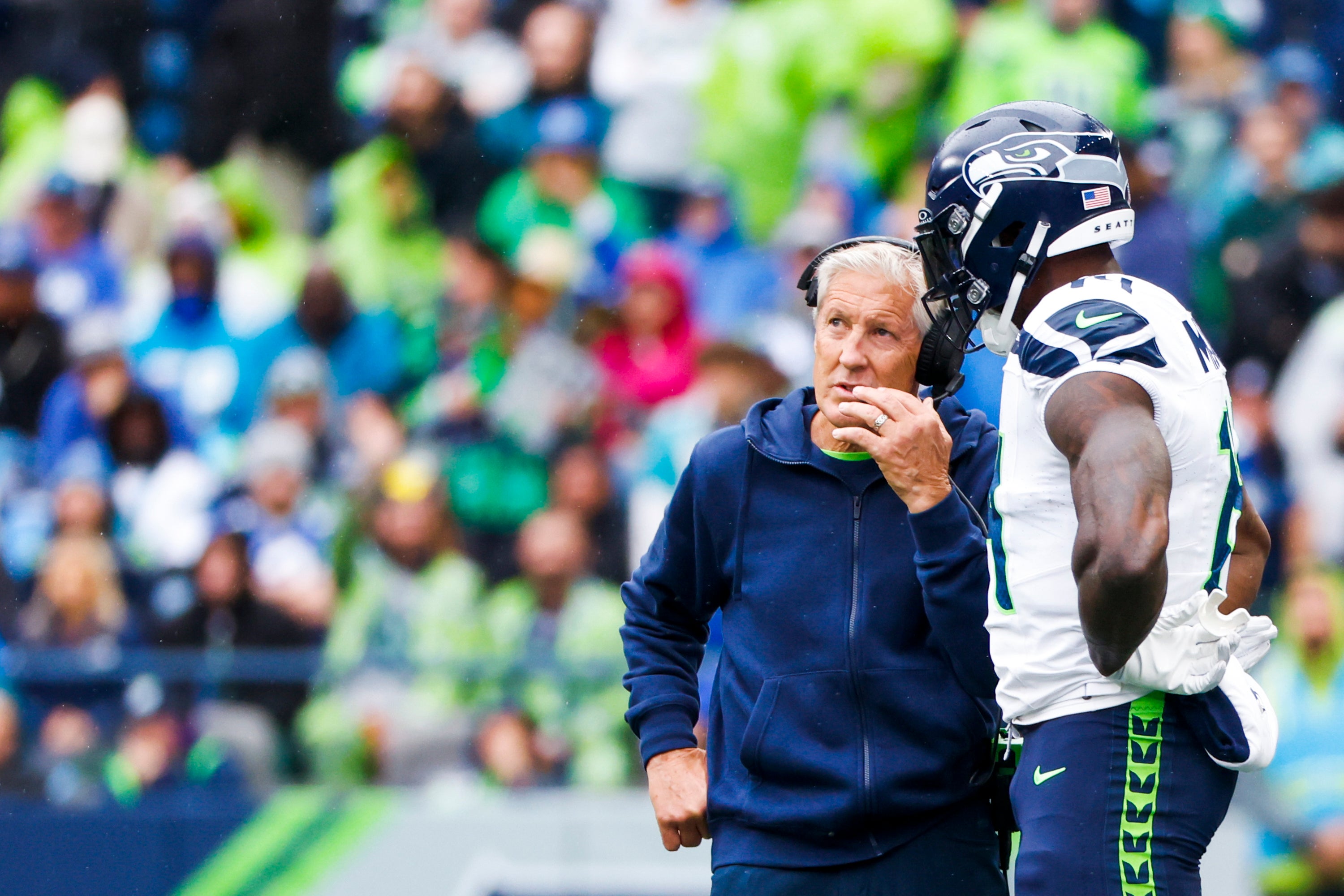 Sep 24, 2023; Seattle, Washington, USA; Seattle Seahawks head coach Pete Carroll talks with wide receiver DK Metcalf (14) during a third quarter timeout against the Carolina Panthers at Lumen Field. Mandatory Credit: Joe Nicholson-USA TODAY Sports