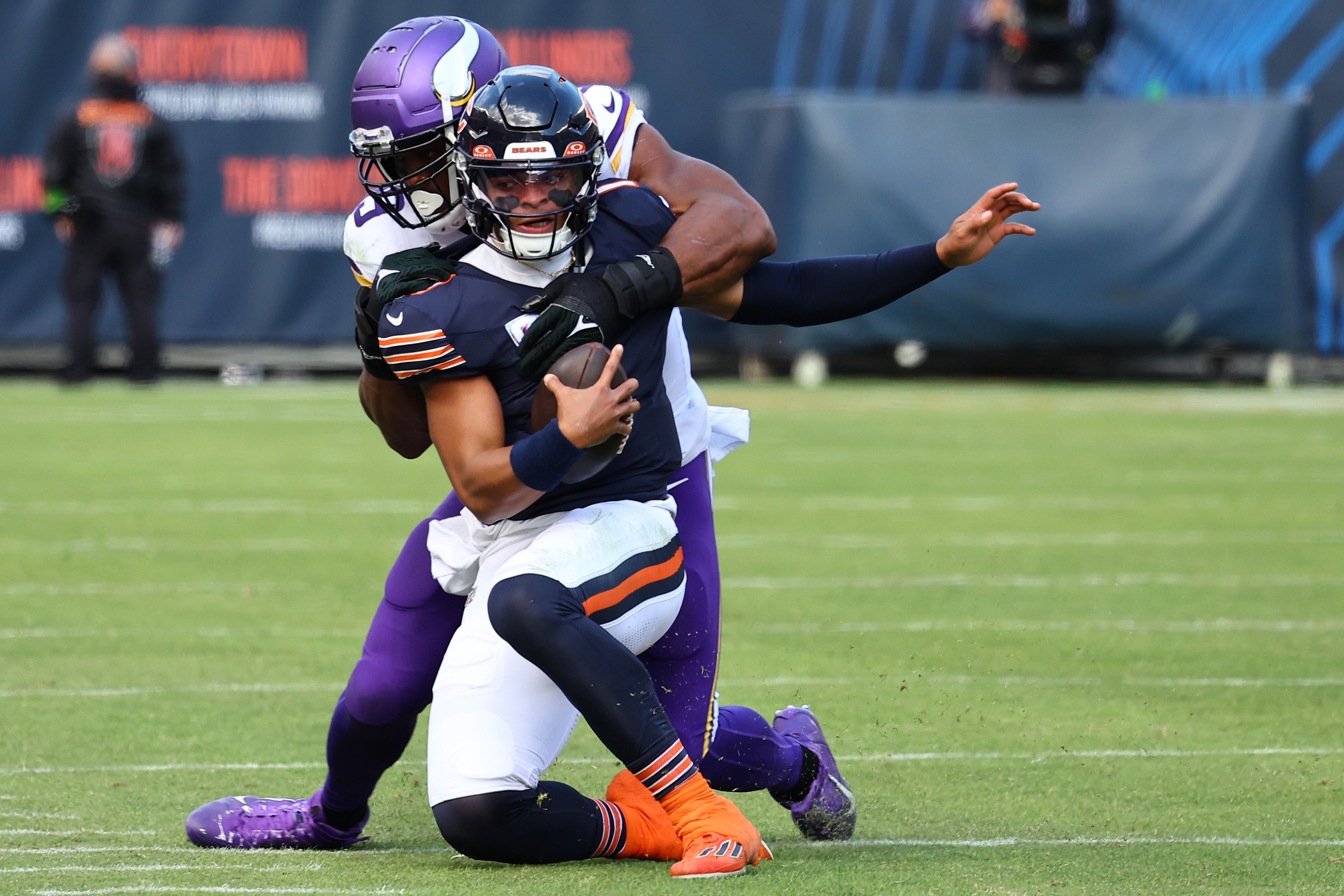 Oct 15, 2023; Chicago, Illinois, USA; Minnesota Vikings linebacker Danielle Hunter (99) tackles Chicago Bears quarterback Justin Fields (1) during the second half at Soldier Field.