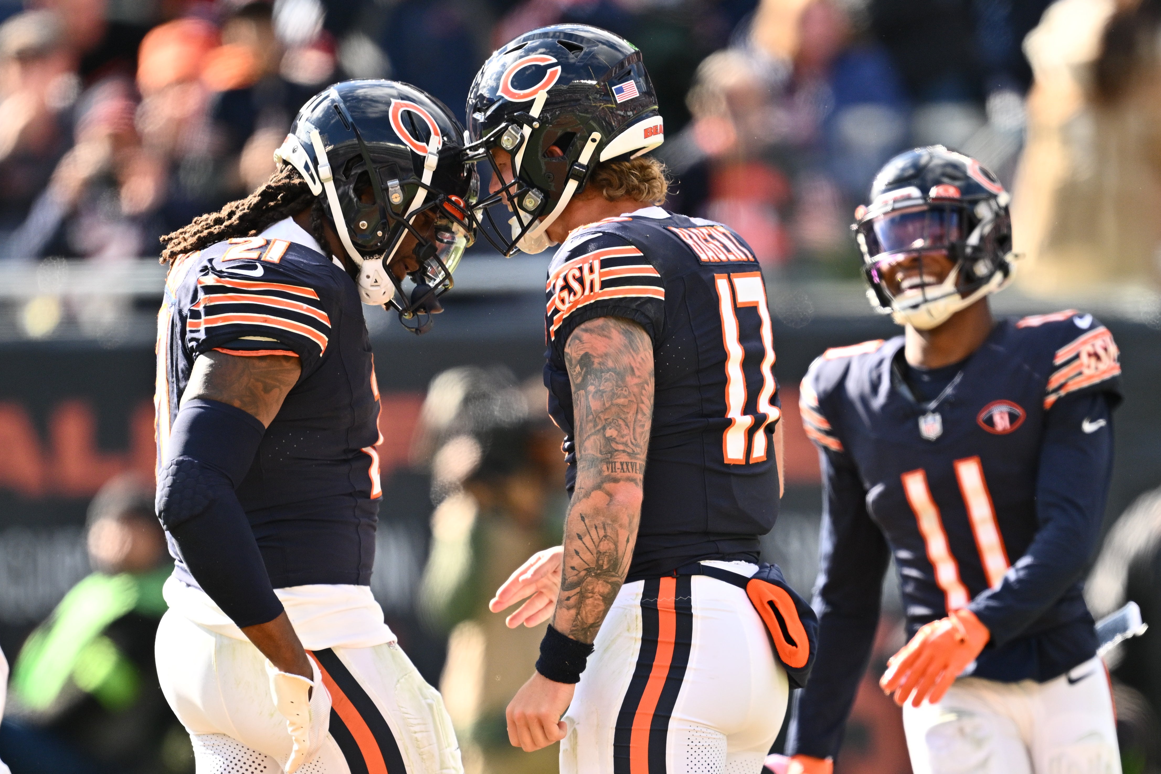 Oct 15, 2023; Chicago, Illinois, USA; Chicago Bears quarterback Tyson Bagent (17) celebrates with running back D'Onta Foreman (21) after scoring a touchdown in the second half against the Minnesota Vikings at Soldier Field.