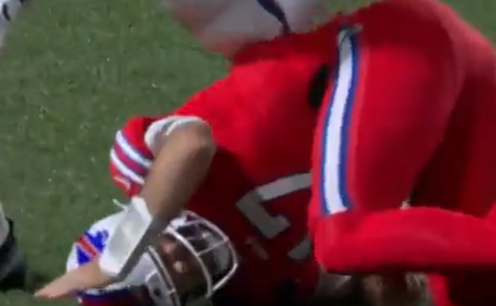 Buffalo Bills QB Josh Allen taking a hit late in the game against the New York Giants