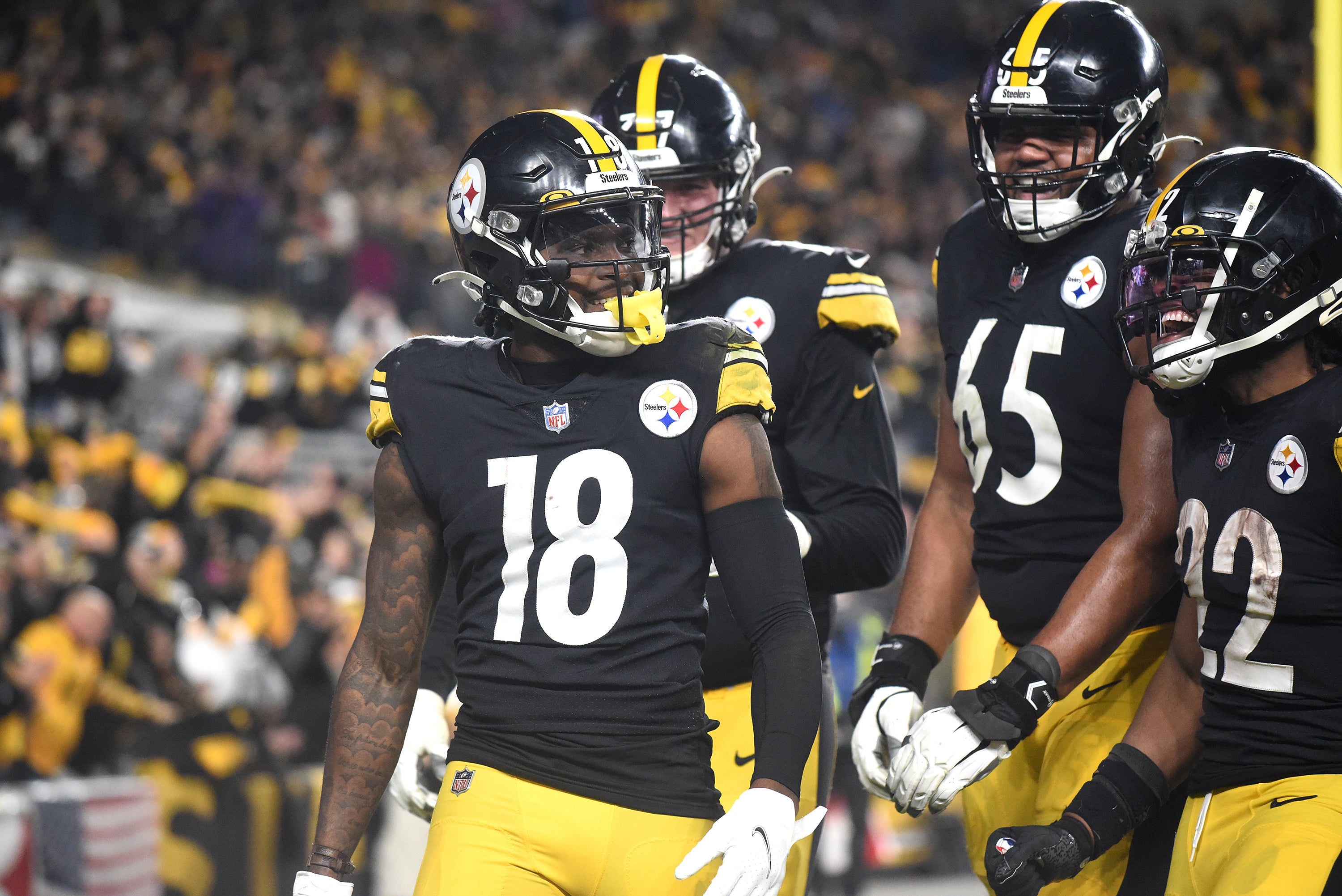 Dec 5, 2021; Pittsburgh, Pennsylvania, USA; Pittsburgh Steelers wide receiver Diontae Johnson (18) celebrates a touchdown during the fourth quarter with offensive lineman John Leglue (77) and Dan Moore Jr. (65) and Najee Harris (22) against the Baltimore Ravens at Heinz Field. Mandatory Credit: Philip G. Pavely-USA TODAY Sports