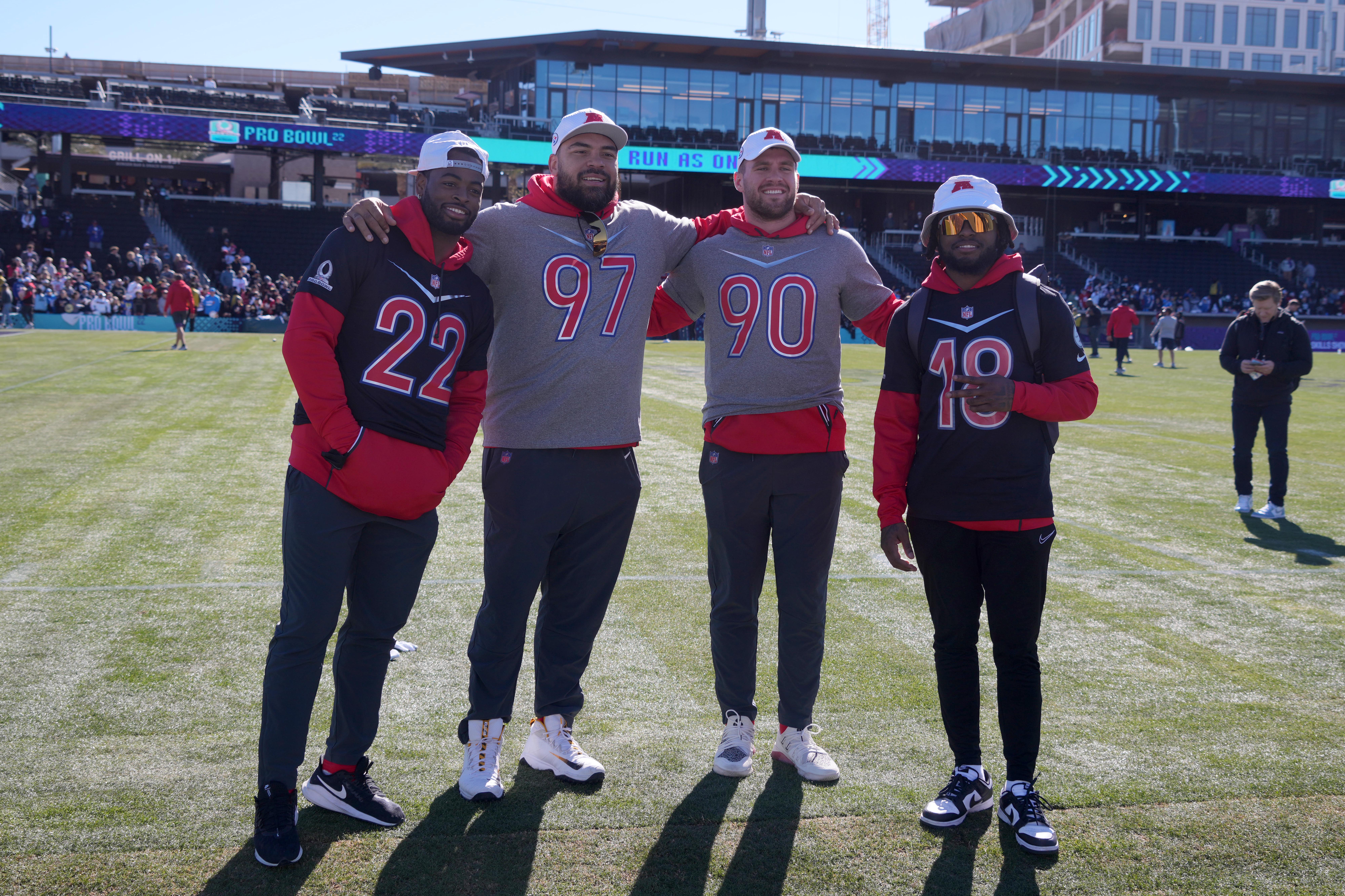 Feb 4, 2022; Las Vegas, NV, USA; Pittsburgh Steelers running back Najee Harris (22), lineman Cameron Heyward (97), linebacker T.J. Watt (90) and receiver Diontae Johnson (18) pose during AFC practice at the Las Vegas Ballpark. Mandatory Credit: Kirby Lee-USA TODAY Sports