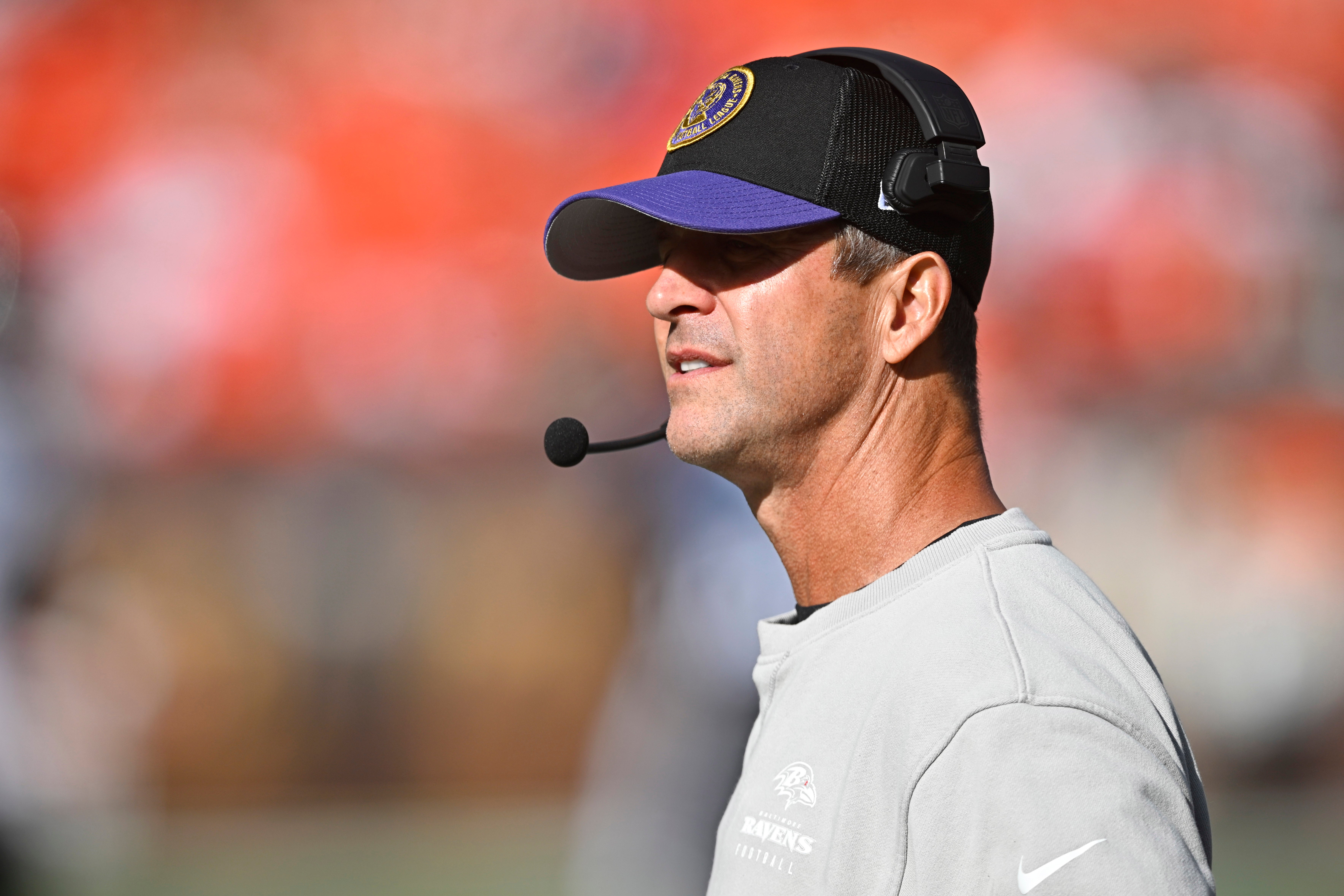 Baltimore Ravens head coach John Harbaugh stands on the sideline in the fourth quarter against the Cleveland Browns at Cleveland Browns Stadium.