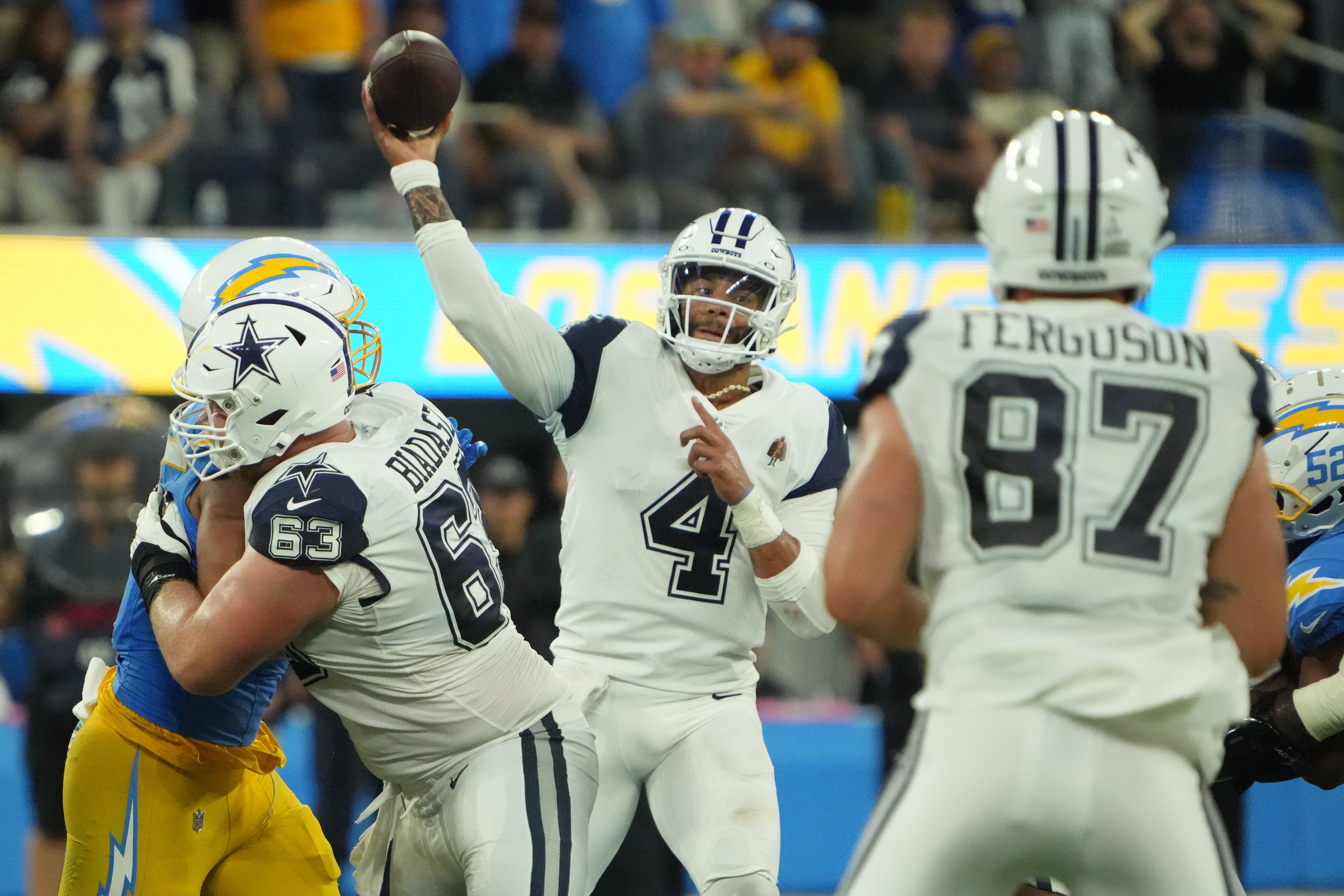 Dallas Cowboys quarterback Dak Prescott (4) throws the ball against the Los Angeles Chargers in the second half at SoFi Stadium. Mandatory Credit: Kirby Lee-USA TODAY Sports