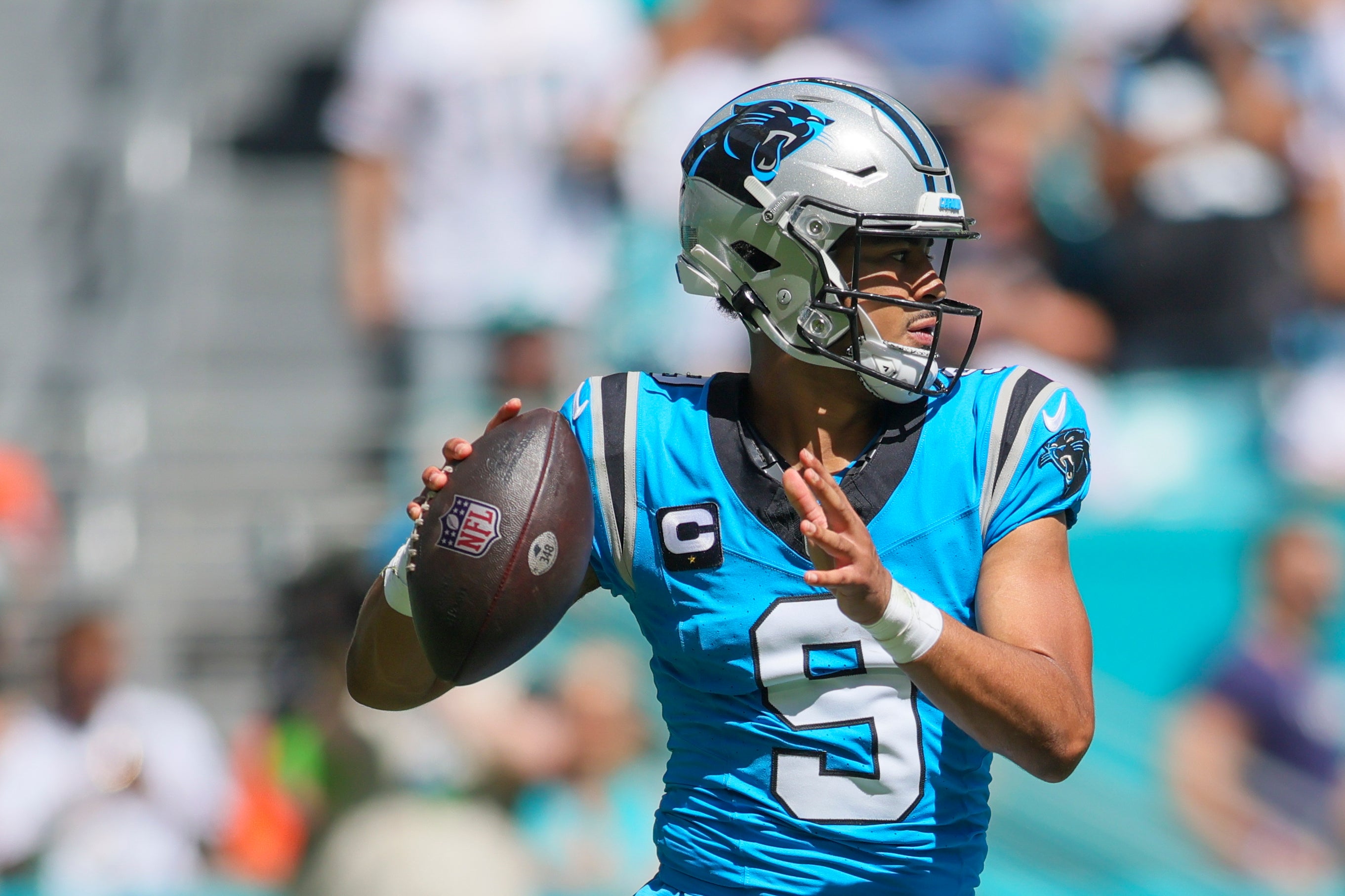 Oct 15, 2023; Miami Gardens, Florida, USA; Carolina Panthers quarterback Bryce Young (9) looks for a passing option against the Miami Dolphins during the first quarter at Hard Rock Stadium. Mandatory Credit: Sam Navarro-USA TODAY Sports