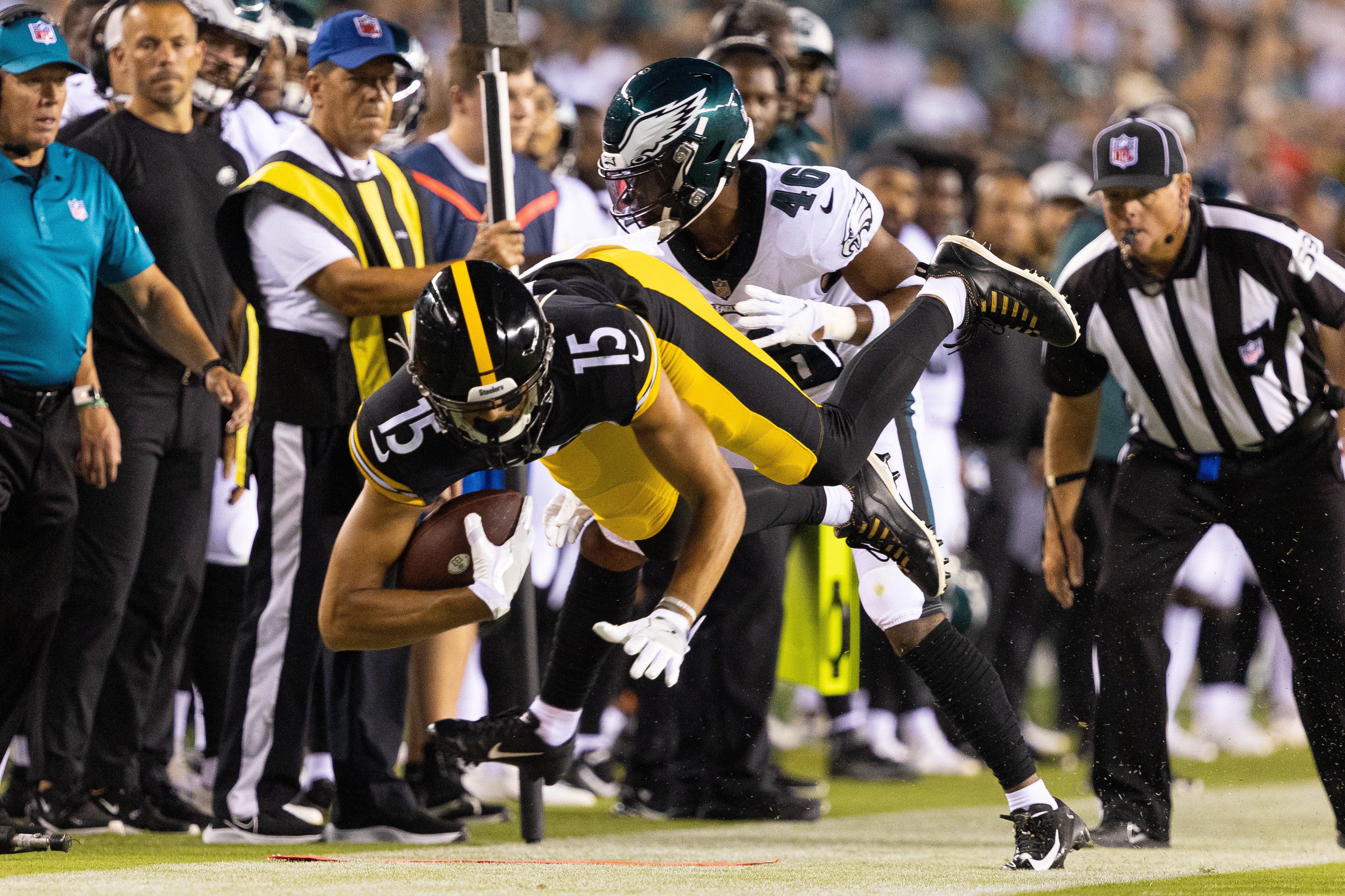 Aug 12, 2021; Philadelphia, Pennsylvania, USA; Pittsburgh Steelers wide receiver Cody White (15) is knocked out of bounds by Philadelphia Eagles cornerback Josiah Scott (46) during the second quarter at Lincoln Financial Field. Mandatory Credit: Bill Streicher-USA TODAY Sports