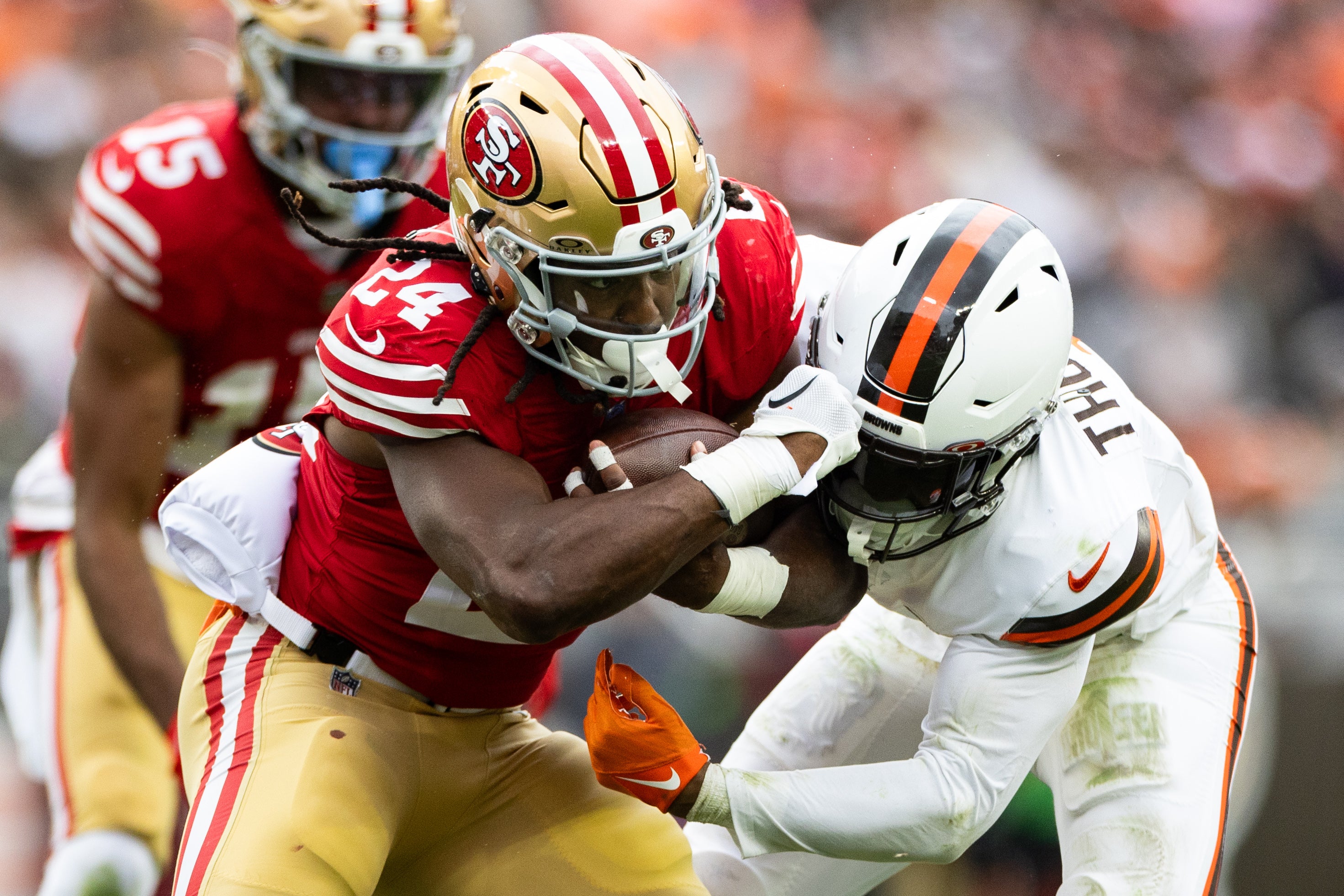 Oct 15, 2023; Cleveland, Ohio, USA; Cleveland Browns safety Juan Thornhill (1) tackles San Francisco 49ers running back Jordan Mason (24) during the third quarter at Cleveland Browns Stadium.