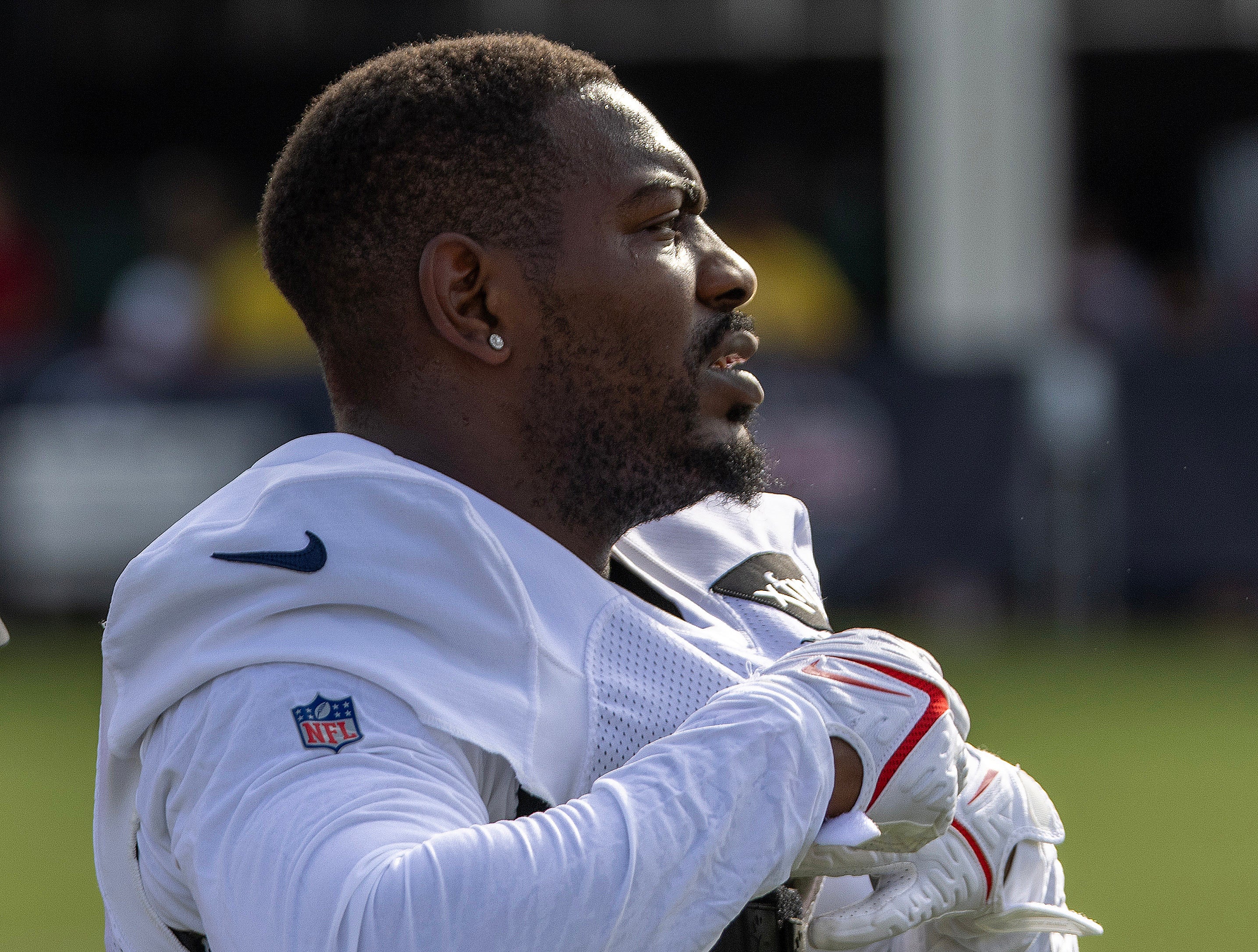Jul 30, 2023; Houston, TX, USA; Houston Texans cornerback Desmond King II (0) puts his jersey on before training camp practice at the Houston Methodist Training Center. Mandatory Credit: Thomas Shea-USA TODAY Sports  