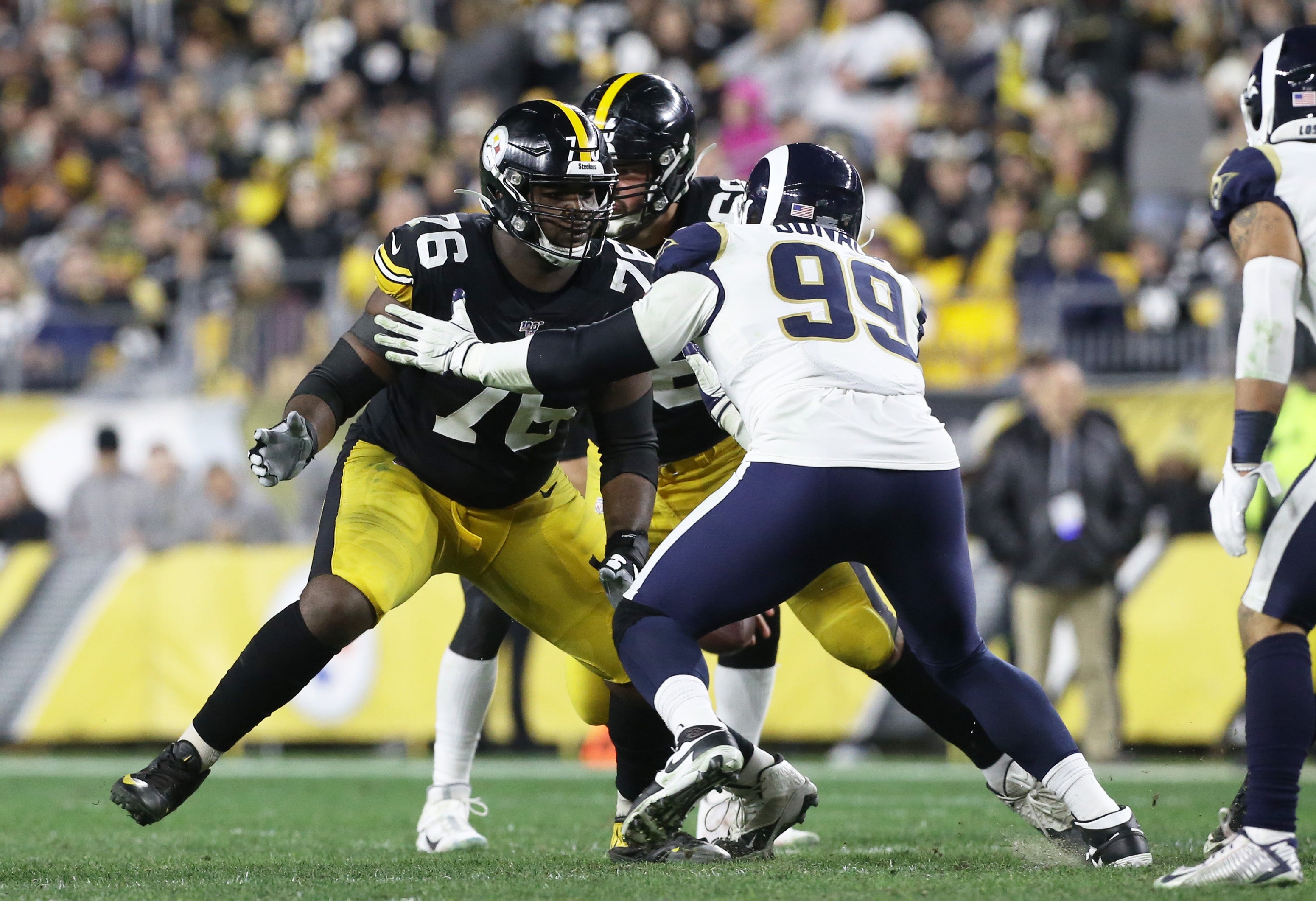 Nov 10, 2019; Pittsburgh, PA, USA; Pittsburgh Steelers offensive tackle Chukwuma Okorafor (76) blocks at the line of scrimmage against Los Angeles Rams defensive tackle Aaron Donald (99) during the third quarter at Heinz Field. Pittsburgh won 17-12. Mandatory Credit: Charles LeClaire-USA TODAY Sports
