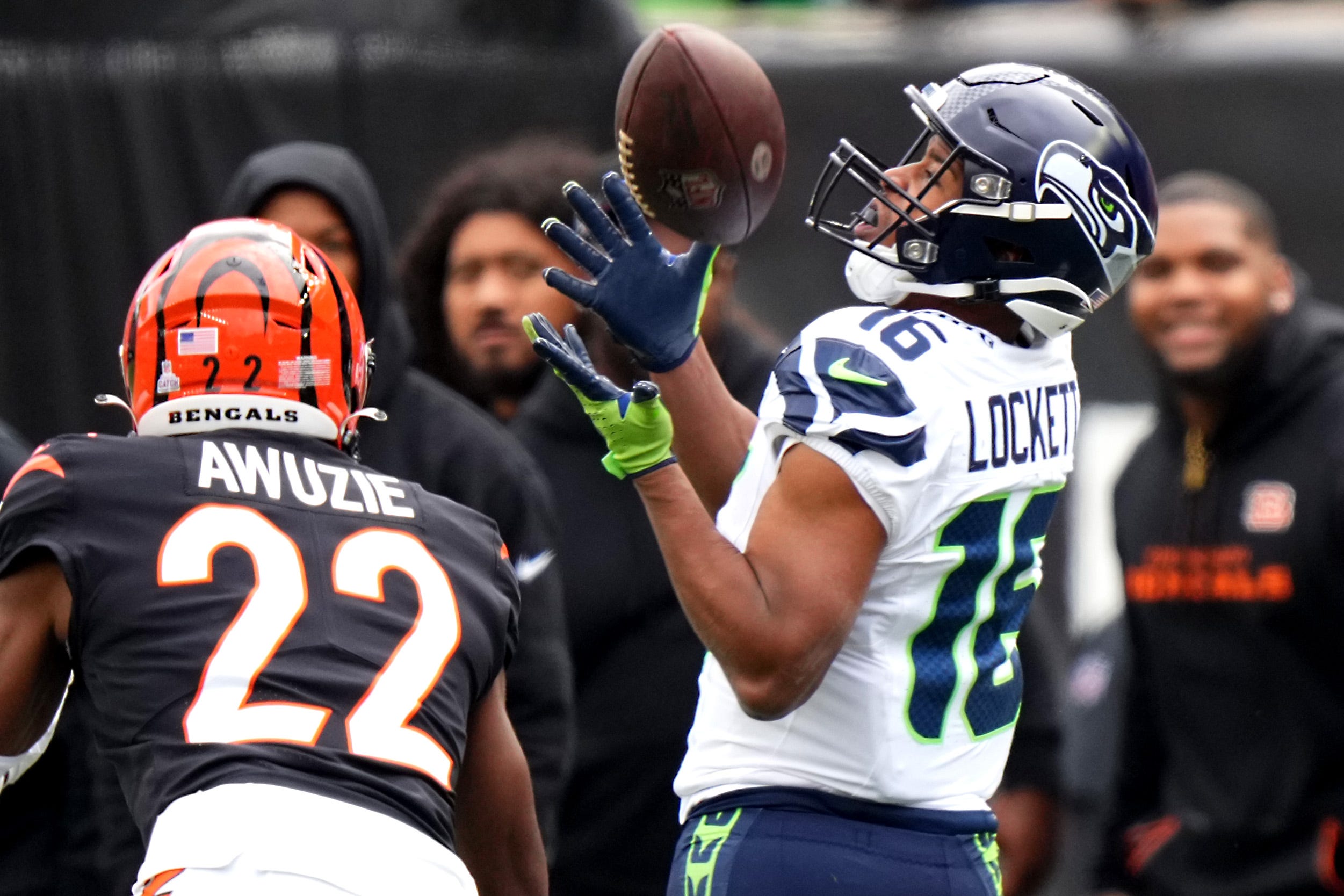 Seattle Seahawks wide receiver Tyler Lockett (16) catches a pass along the sideline as Cincinnati Bengals cornerback Chidobe Awuzie (22) defends in the second quarter during an NFL football game between the Seattle Seahawks and the Cincinnati Bengals Sunday, Oct. 15, 2023, at Paycor Stadium in Cincinnati.