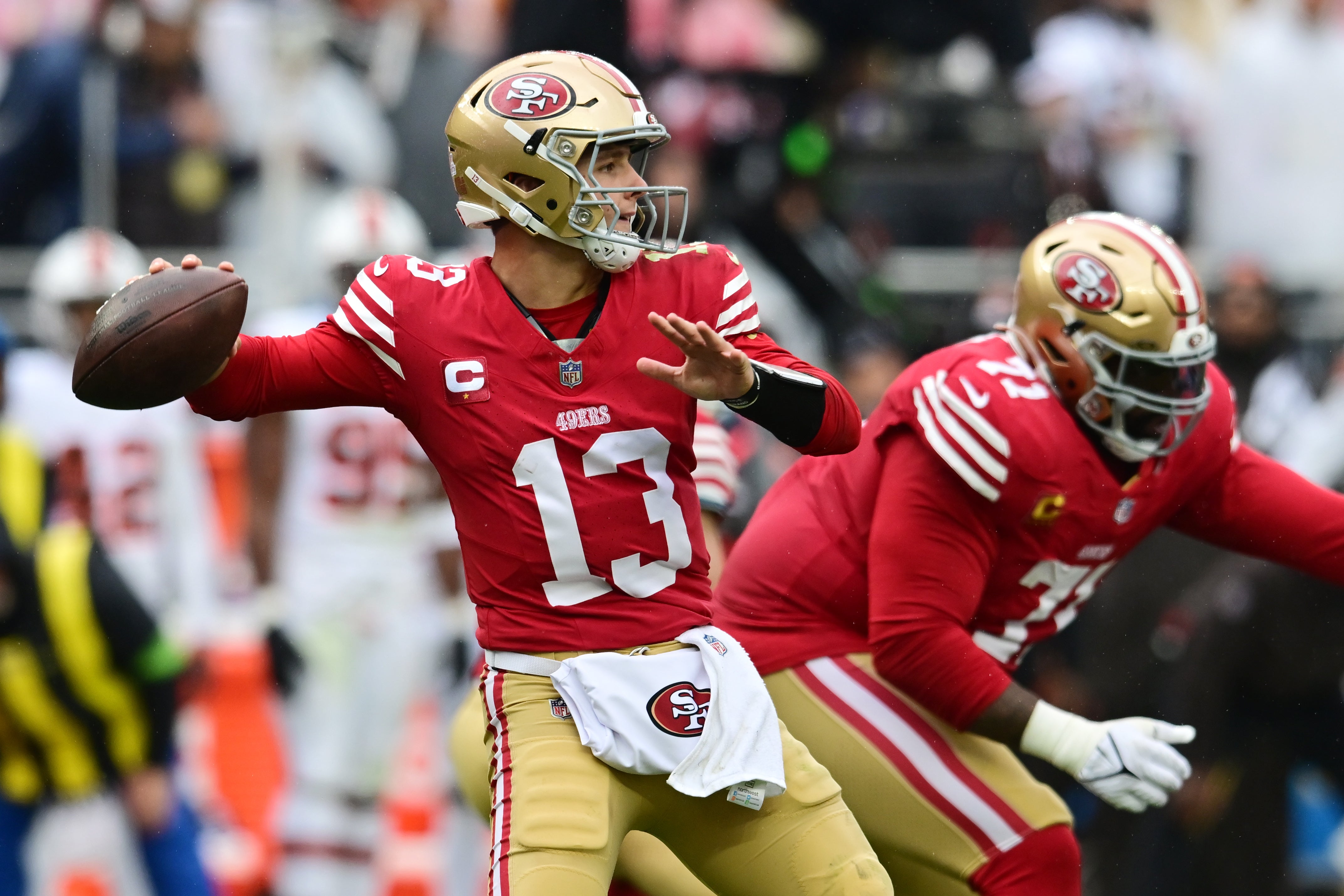 Oct 15, 2023; Cleveland, Ohio, USA; San Francisco 49ers quarterback Brock Purdy (13) throws a pass during the first half against the Cleveland Browns at Cleveland Browns Stadium.