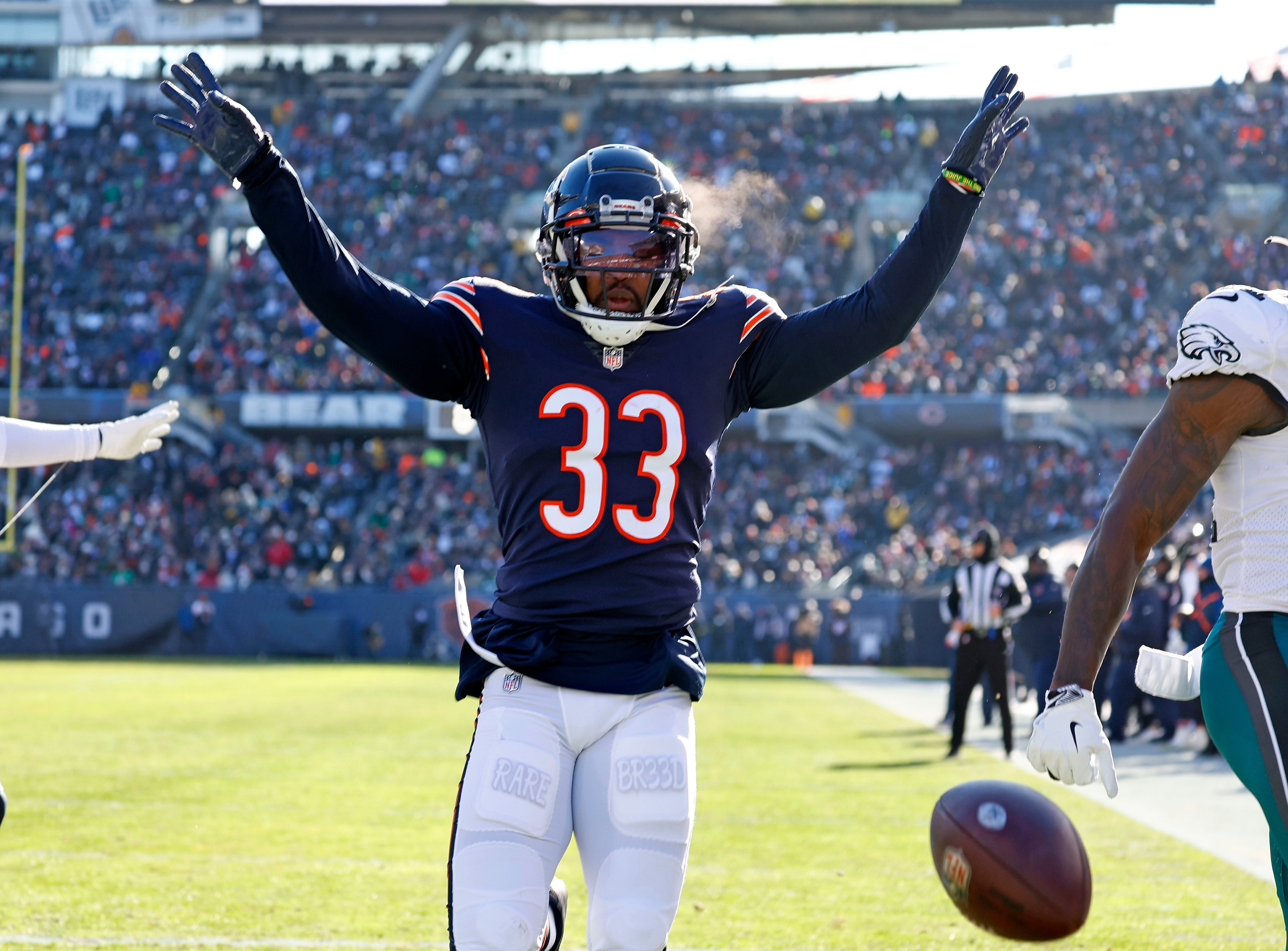 Dec 18, 2022; Chicago, Illinois, USA; Chicago Bears cornerback Jaylon Johnson (33) reacts after a play against the Philadelphia Eagles during the second quarter at Soldier Field.