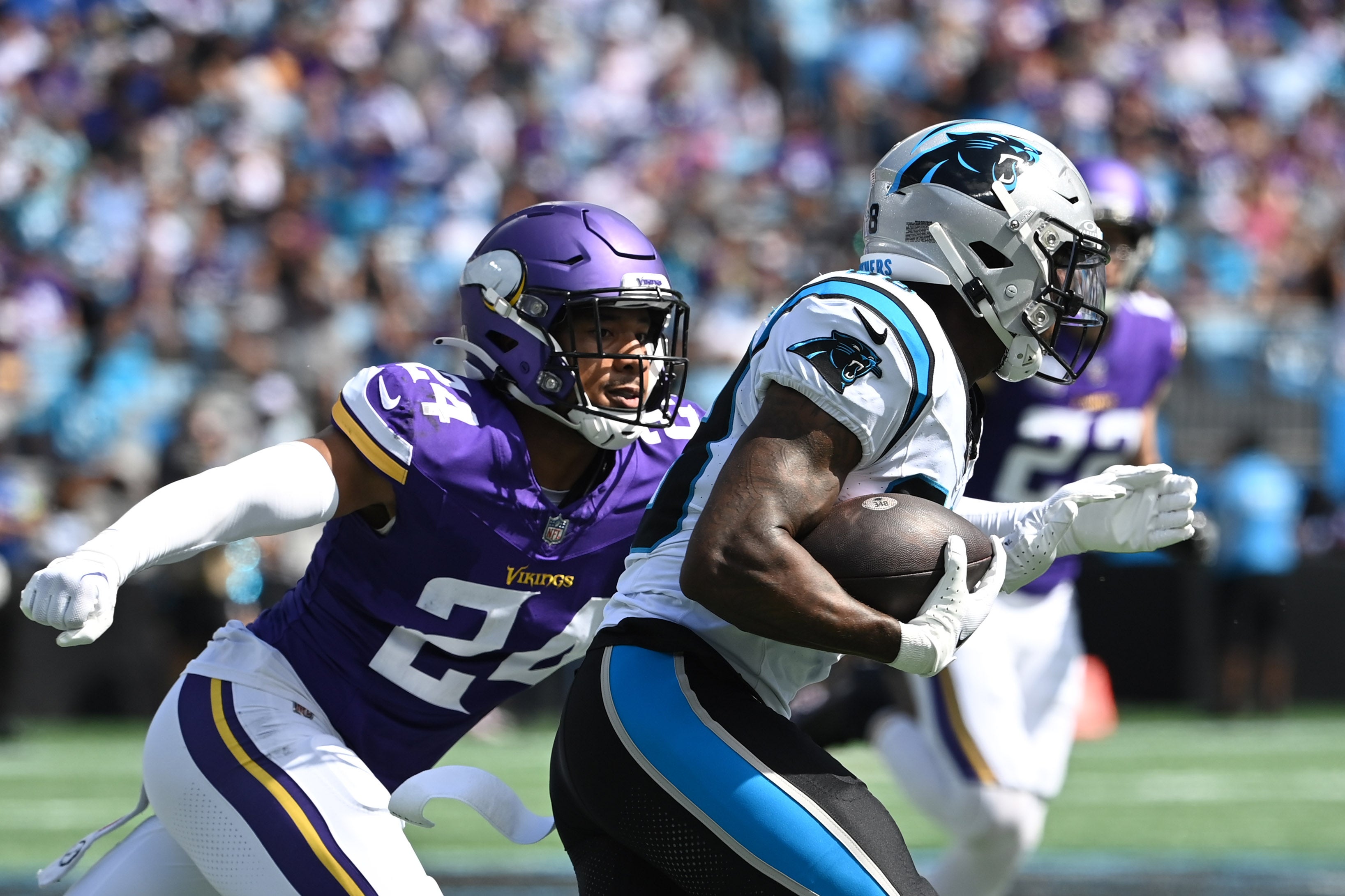 Oct 1, 2023; Charlotte, North Carolina, USA; Carolina Panthers wide receiver Terrace Marshall Jr. (88) with the ball as Minnesota Vikings safety Camryn Bynum (24) defends in the second quarter at Bank of America Stadium. Mandatory Credit: Bob Donnan-USA TODAY Sports