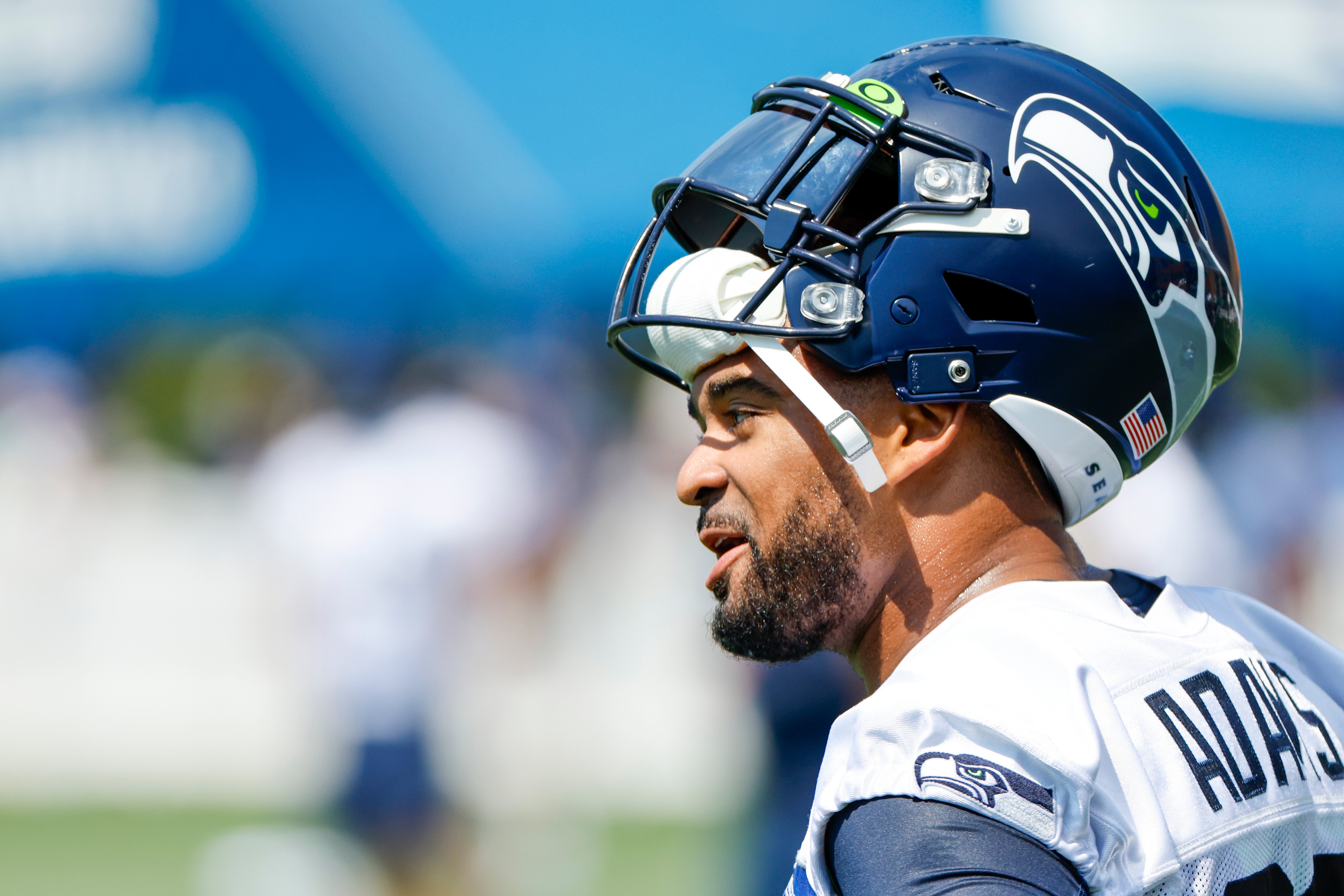 Jul 27, 2022; Renton, WA, USA; Seattle Seahawks safety Jamal Adams (33) talks with a teammate during training camp practice at Virginia Mason Athletic Center. Mandatory Credit: Joe Nicholson-USA TODAY Sports