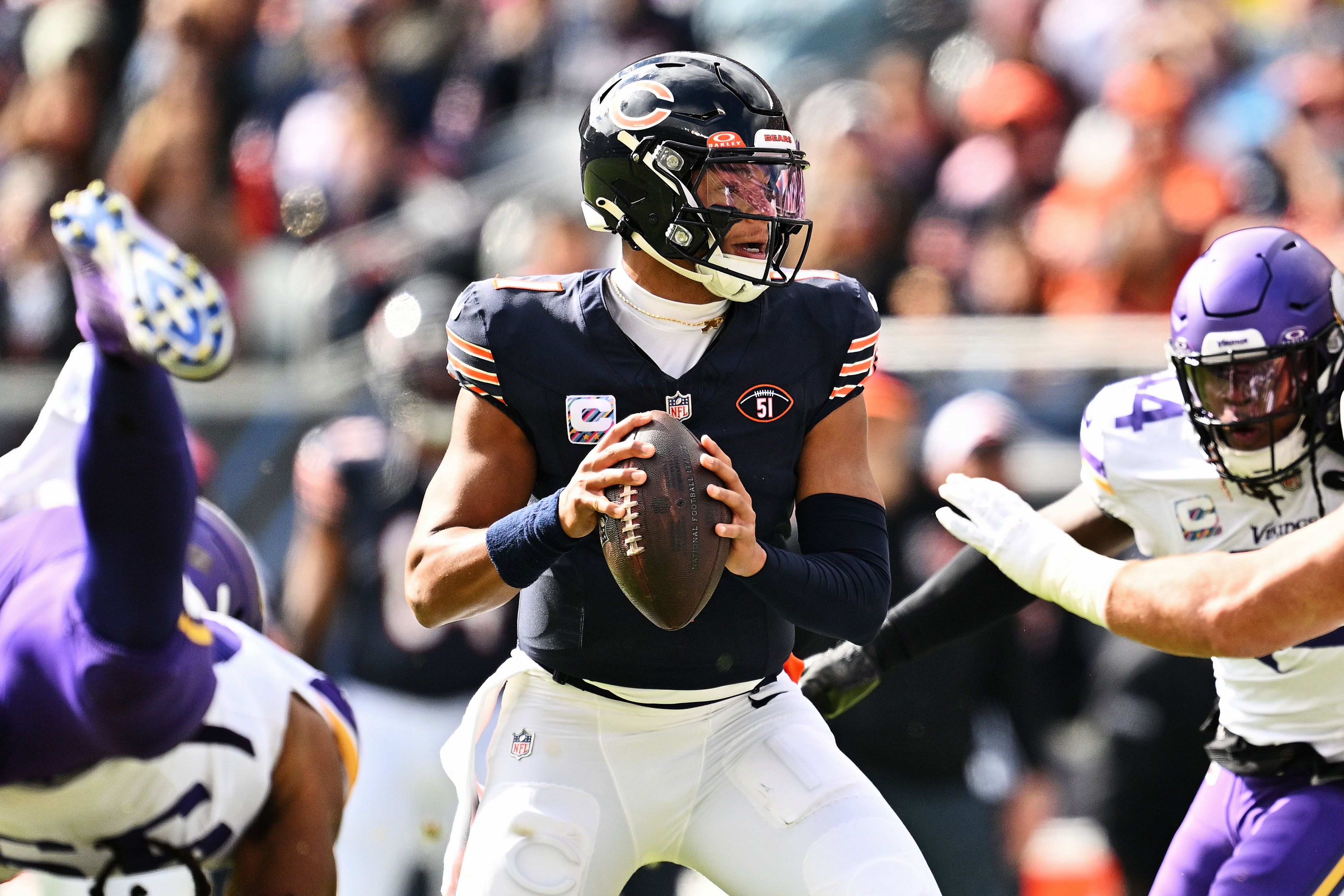Oct 15, 2023; Chicago, Illinois, USA; Chicago Bears quarterback Justin Fields (1) passes against the Minnesota Vikings at Soldier Field.