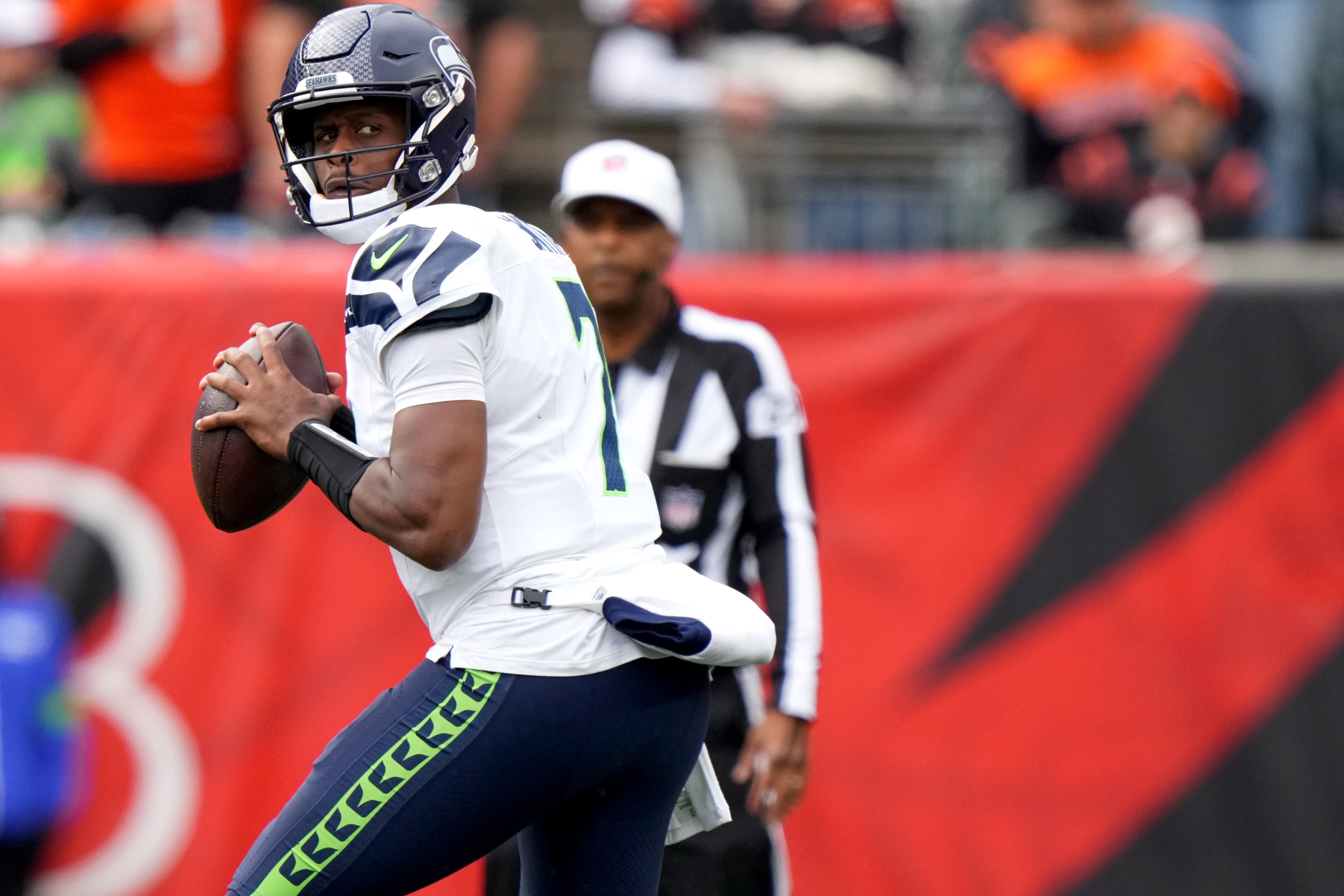 Seattle Seahawks quarterback Geno Smith (7) looks to throw in the fourth quarter during an NFL football game between the Seattle Seahawks and the Cincinnati Bengals Sunday, Oct. 15, 2023, at Paycor Stadium in Cincinnati. The Cincinnati Bengals won, 17-13.