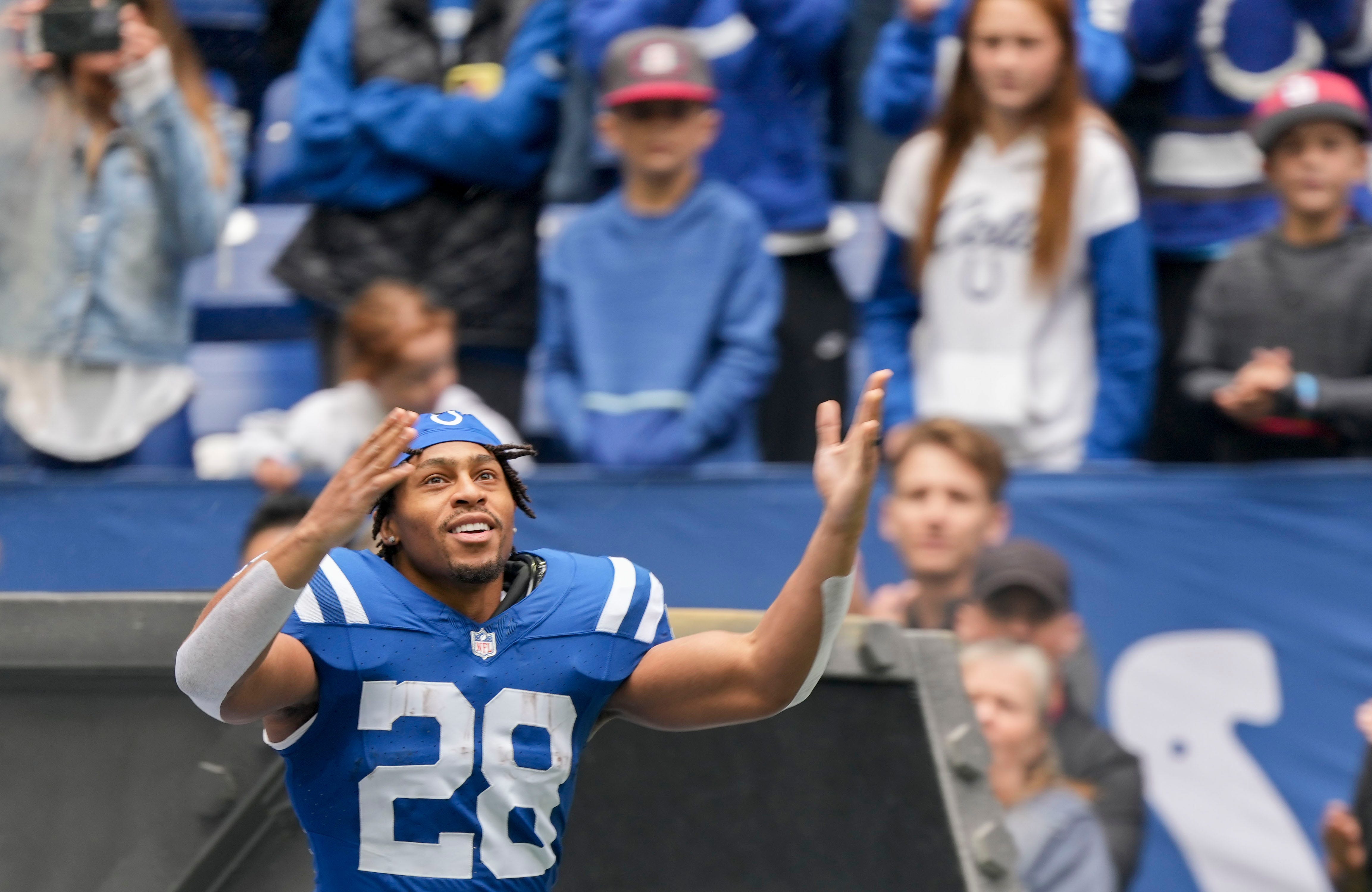 Indianapolis Colts running back Jonathan Taylor (28) gestures to the fans as he takes the field Sunday, Oct. 8, 2023, before a game against the Tennessee Titans at Lucas Oil Stadium in Indianapolis.
