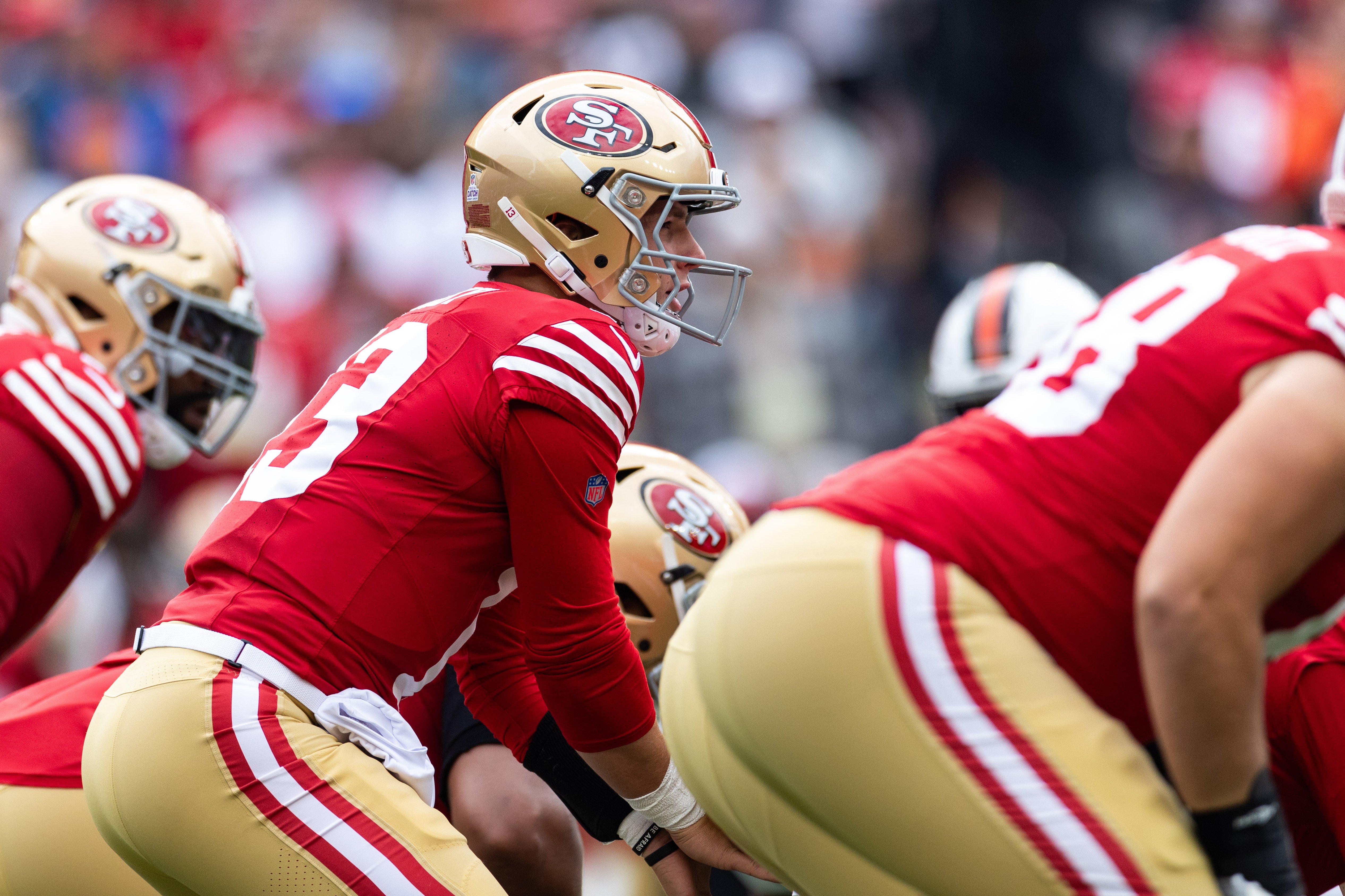 Oct 15, 2023; Cleveland, Ohio, USA; San Francisco 49ers quarterback Brock Purdy (13) readies for the ball snap against the Cleveland Browns during the first quarter at Cleveland Browns Stadium.