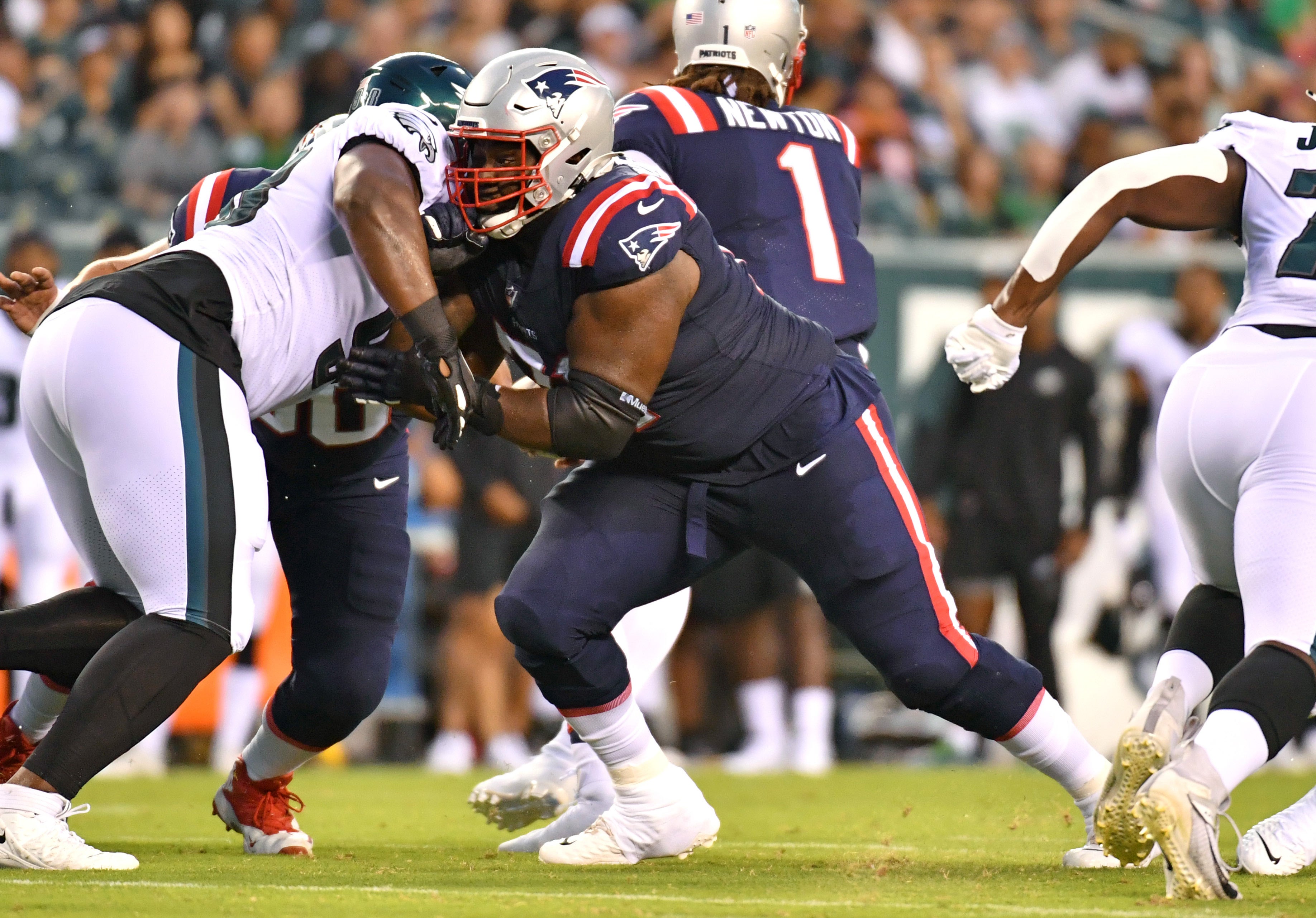 Aug 19, 2021; Philadelphia, Pennsylvania, USA; New England Patriots offensive guard Mike Onwenu (71) blocks against the Philadelphia Eagles at Lincoln Financial Field.