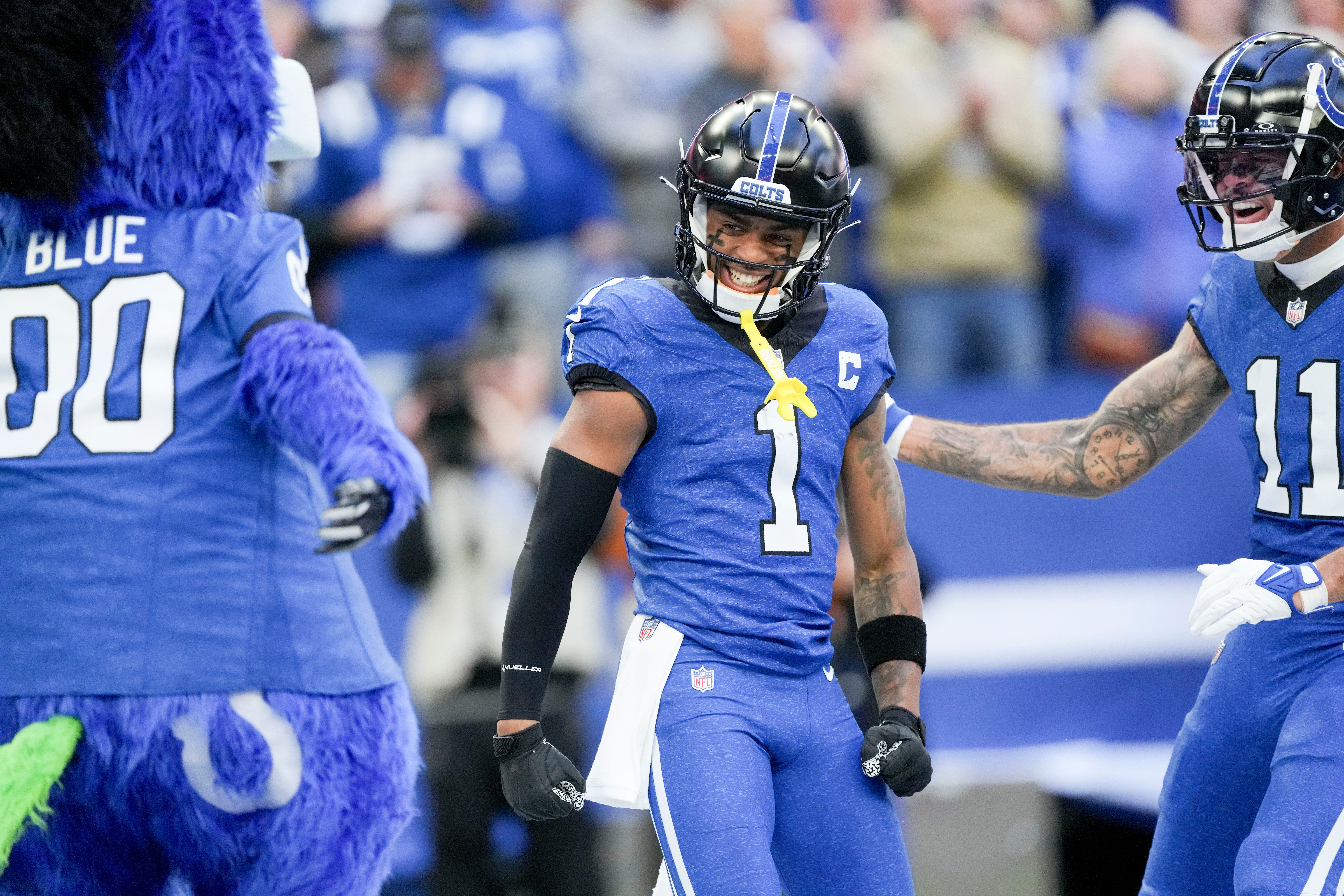 Indianapolis Colts wide receiver Josh Downs (1) is congratulated after scoring a touchdown Sunday, Oct. 22, 2023, during a game against the Cleveland Browns at Lucas Oil Stadium in Indianapolis.