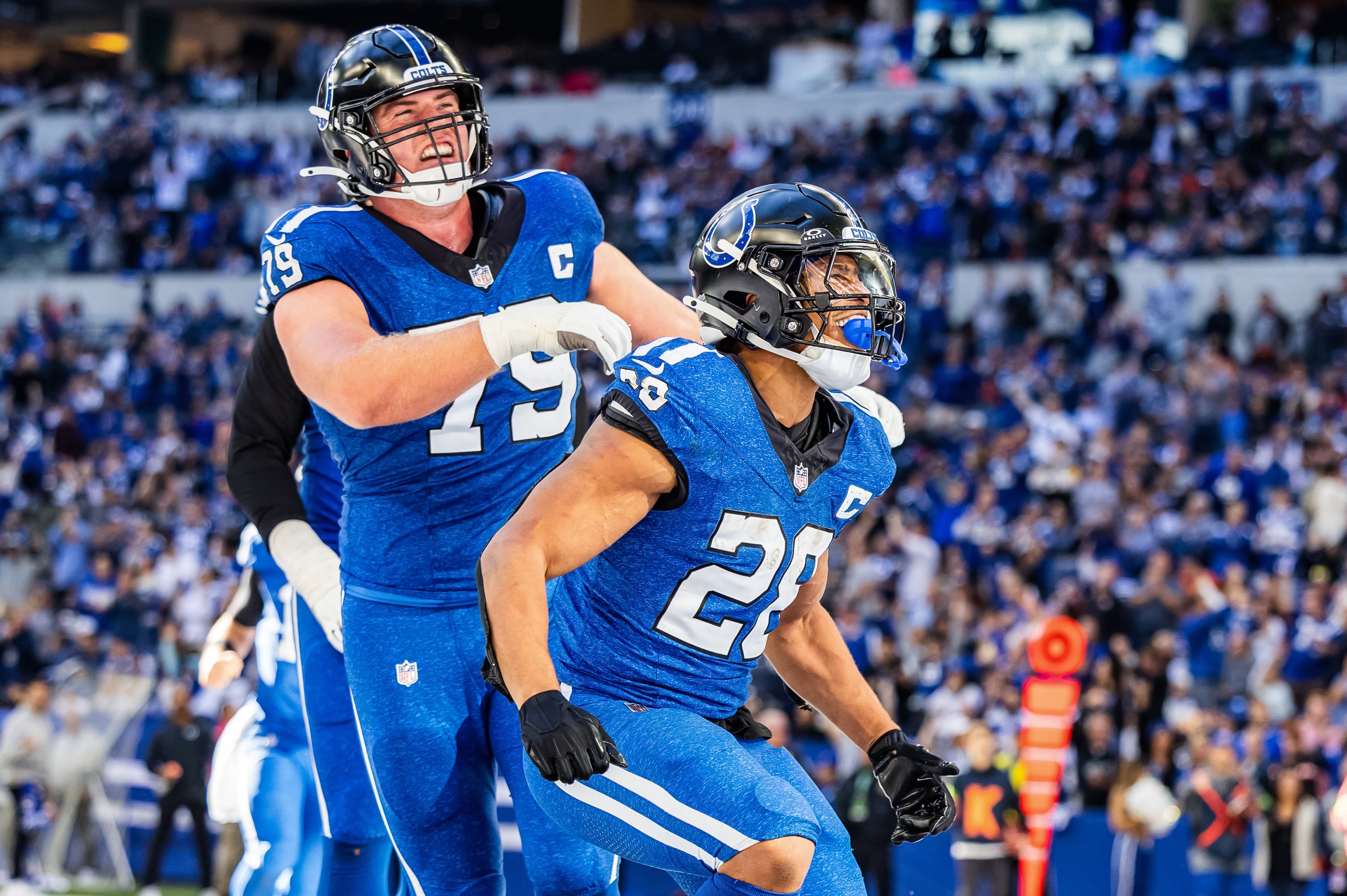 Oct 22, 2023; Indianapolis, Indiana, USA; Indianapolis Colts running back Jonathan Taylor (28) celebrates his touchdown with teammates in the second half against the Cleveland Browns at Lucas Oil Stadium.