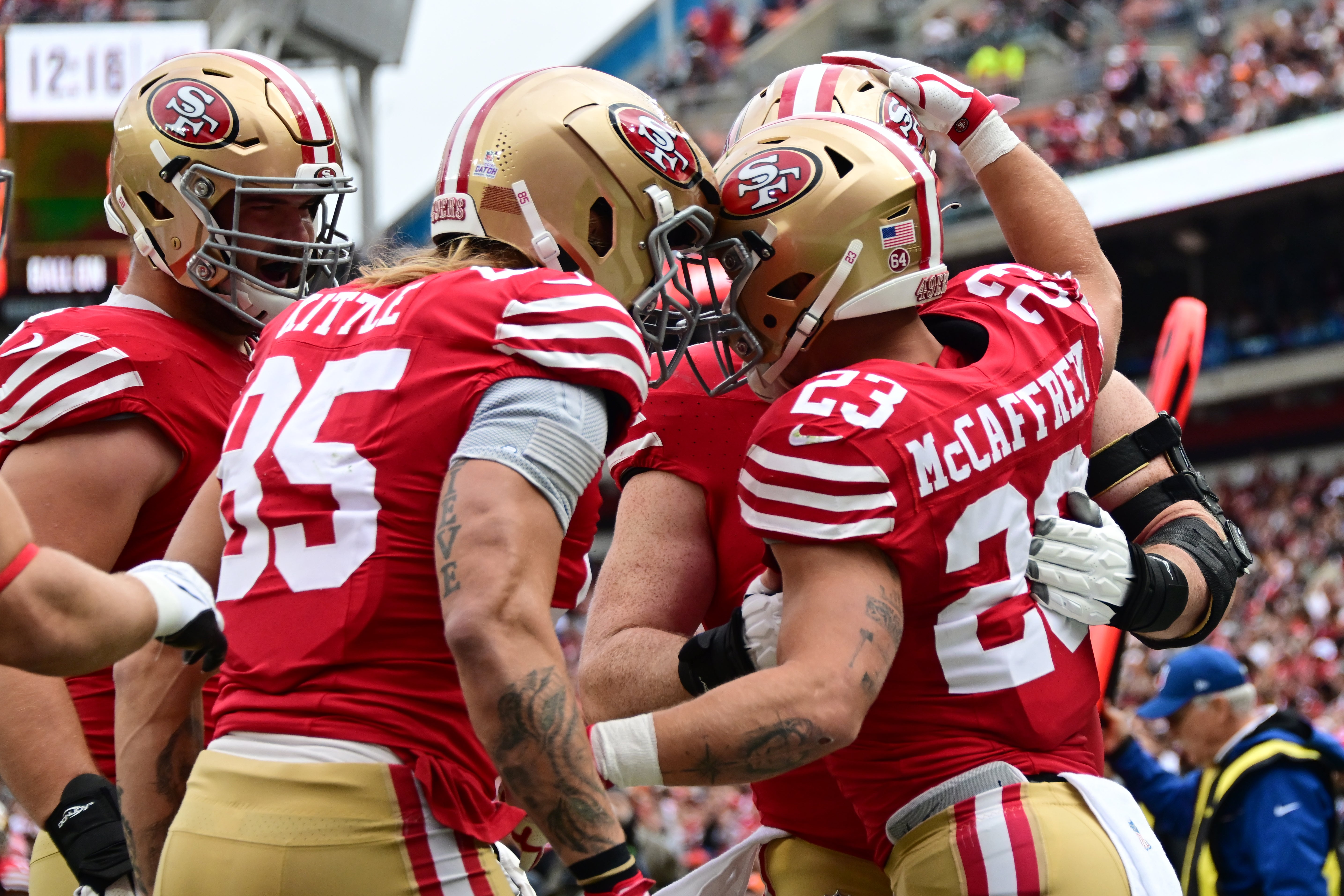 Oct 15, 2023; Cleveland, Ohio, USA; San Francisco 49ers running back Christian McCaffrey (23) celebrates after scoring with tight end George Kittle (85) during the first half against the Cleveland Browns at Cleveland Browns Stadium.