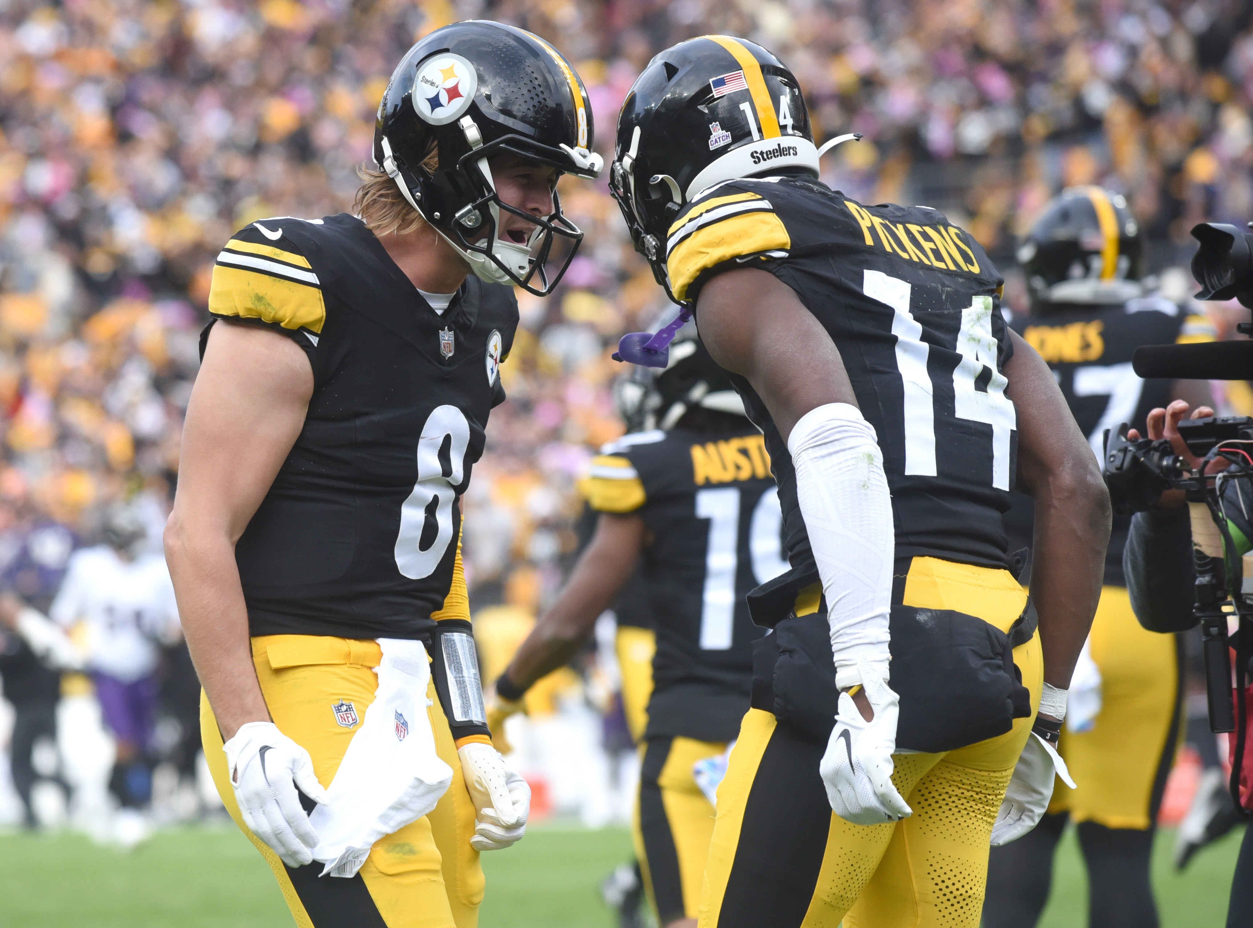 Oct 8, 2023; Pittsburgh, Pennsylvania, USA; Pittsburgh Steelers quarterback Kenny Pickett (8) celebrates a game-winning touchdown with wide receiver George Pickens (14) during the fourth quarter against the Baltimore Ravens at Acrisure Stadium. The Steelers won 17-10. Mandatory Credit: Philip G. Pavely-USA TODAY Sports