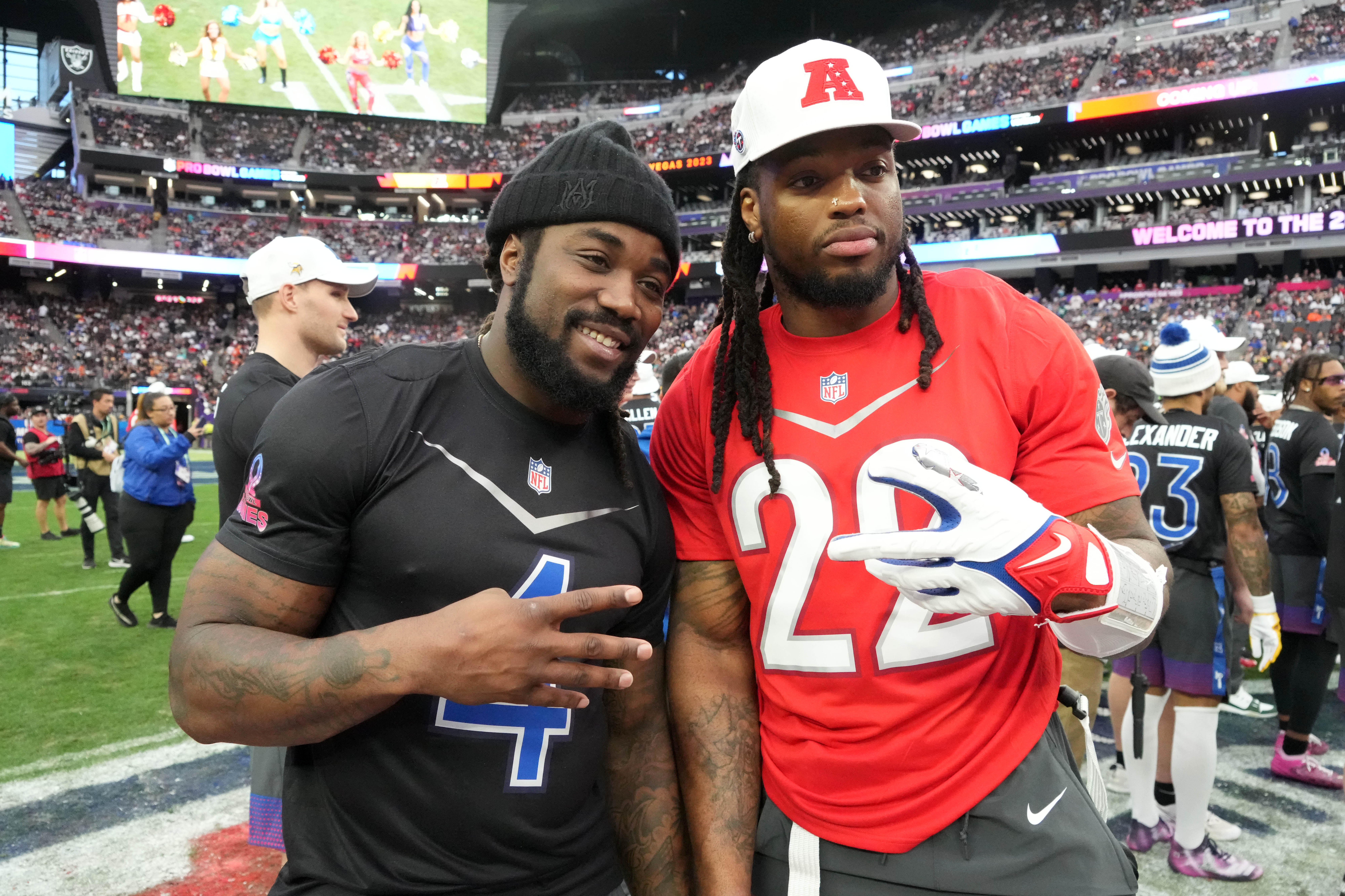 Feb 5, 2023; Paradise, Nevada, USA; NFC running back Dalvin Cook of the Minnesota Vikings (4) and AFC running back Derrick Henry of the Tennessee Titans (22) pose during the Pro Bowl Games at Allegiant Stadium. Mandatory Credit: Kirby Lee-USA TODAY Sports