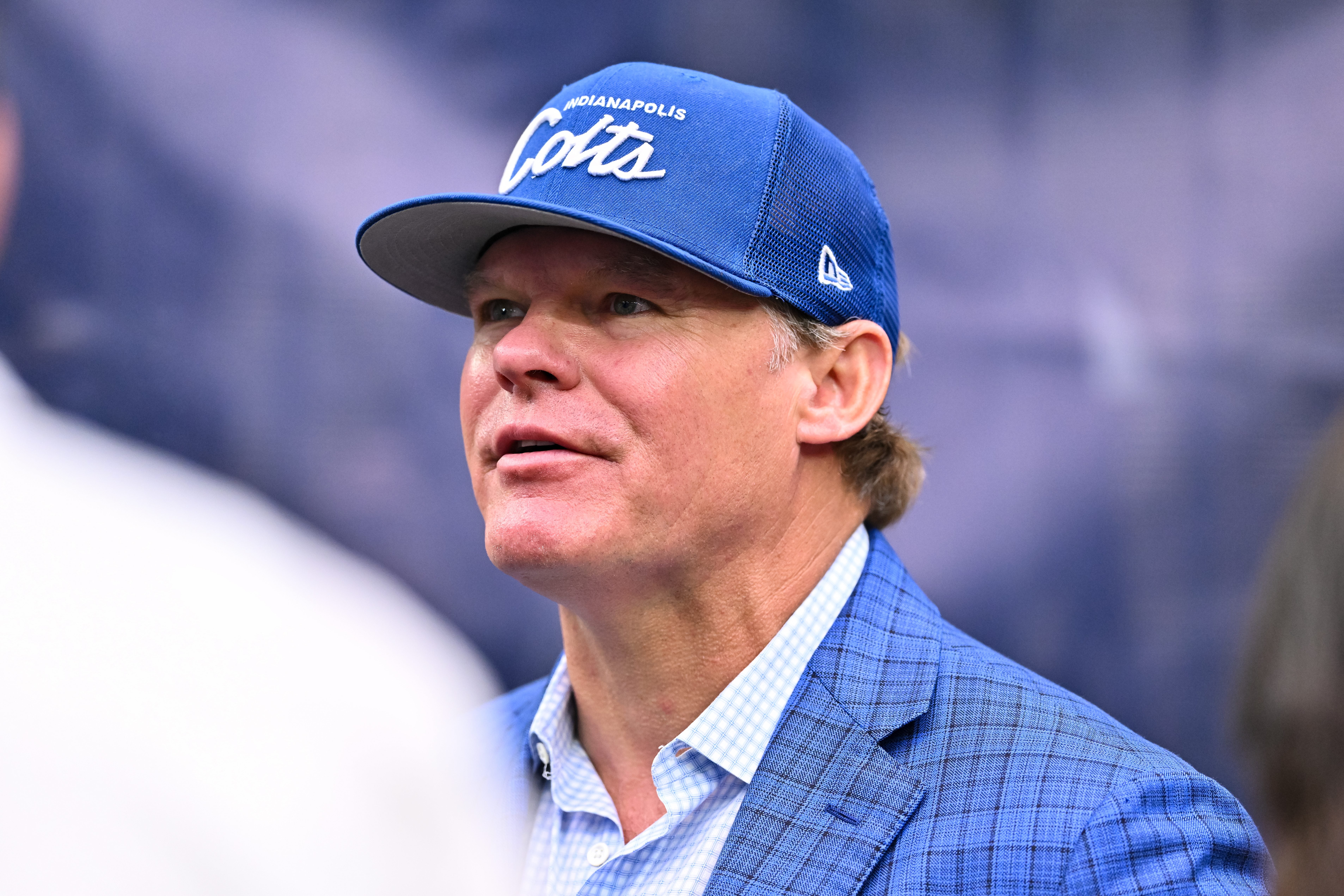 Sep 17, 2023; Houston, Texas, USA; Indianapolis Colts general manager Chris Ballard speaks with fans on the sideline prior to the game against the Houston Texans at NRG Stadium.