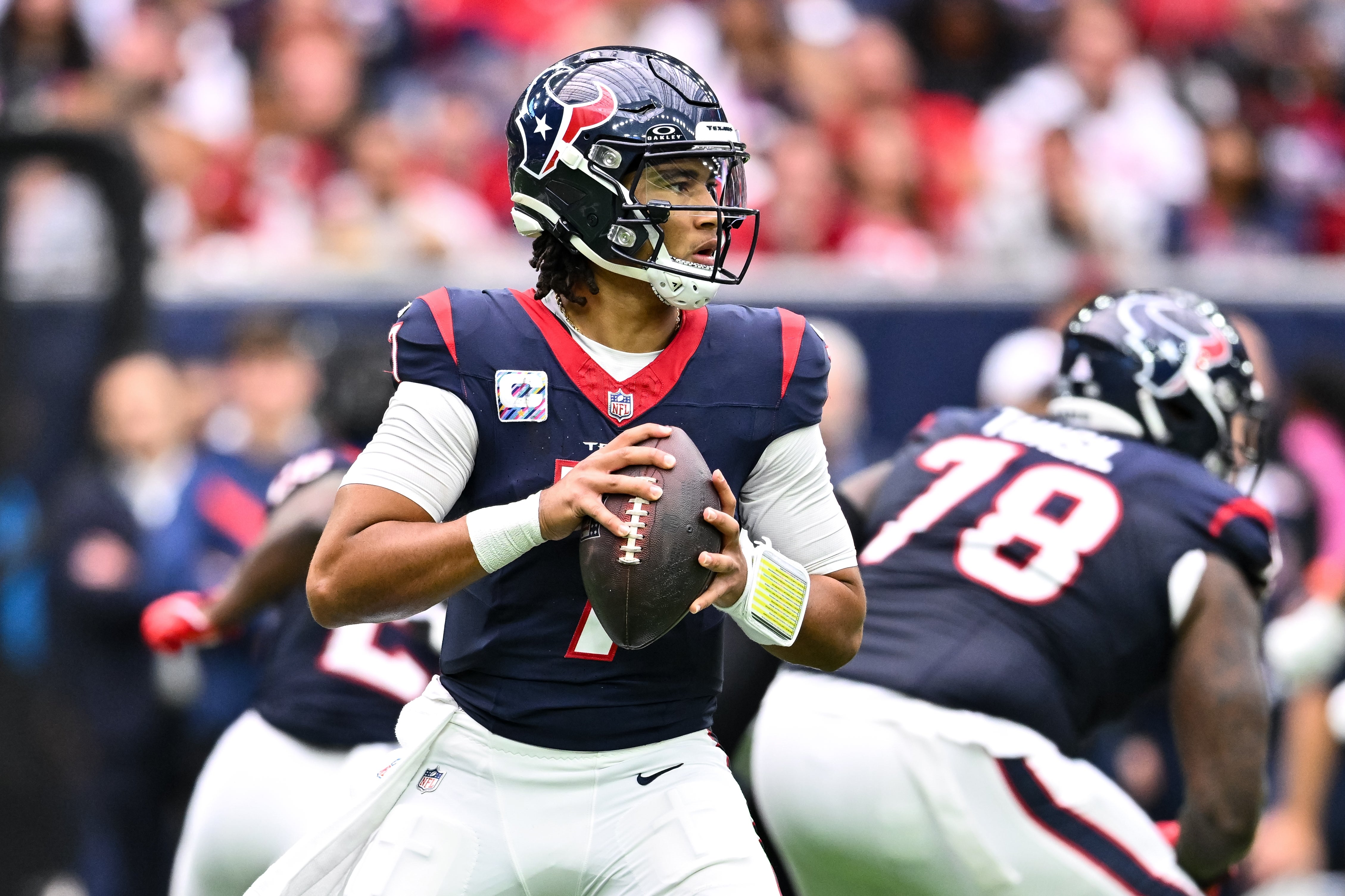 Oct 15, 2023; Houston, Texas, USA; Houston Texans quarterback C.J. Stroud (7) looks to pass the ball during the third quarter against the New Orleans Saints at NRG Stadium. Mandatory Credit: Maria Lysaker-USA TODAY Sports