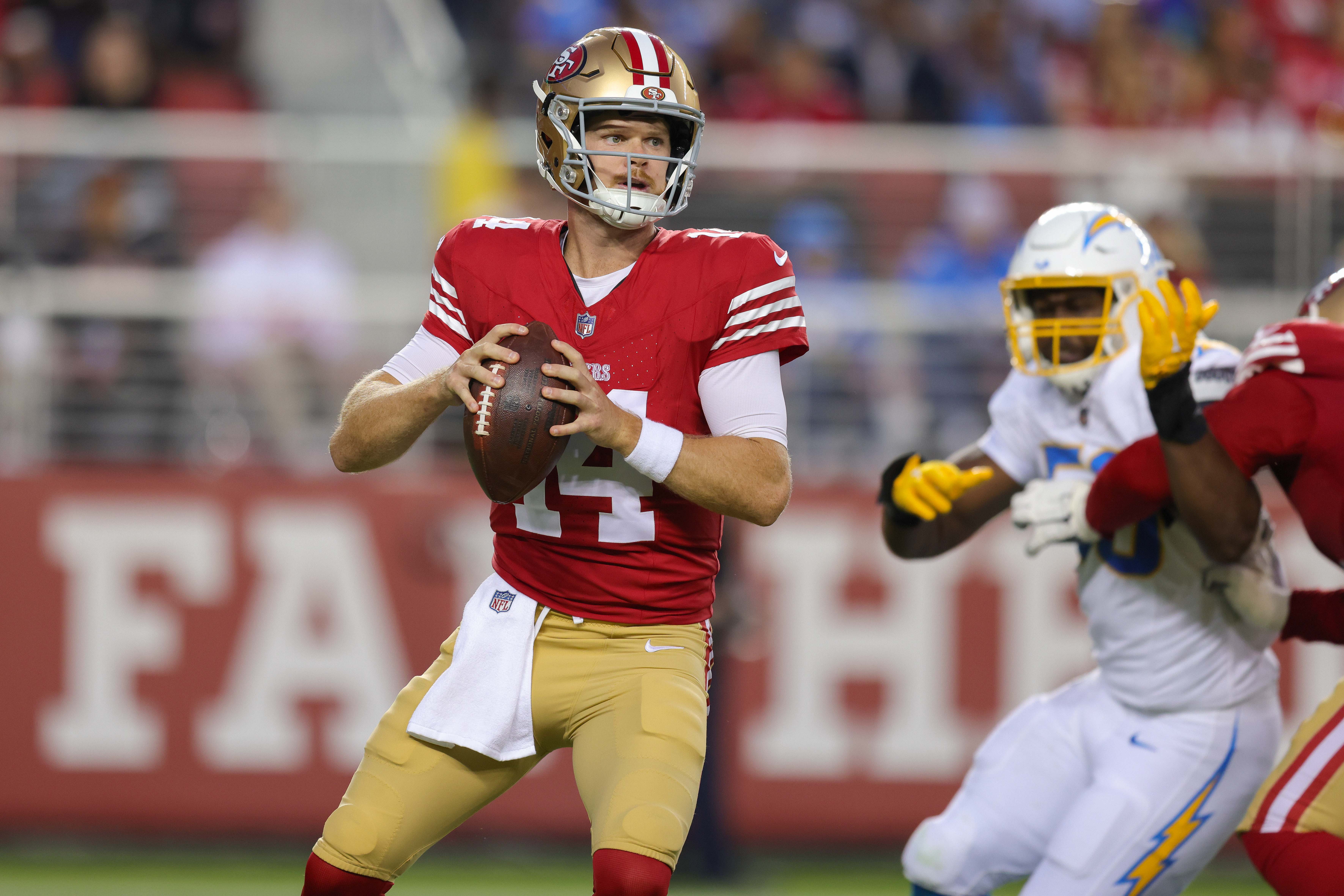 Aug 25, 2023; Santa Clara, California, USA; San Francisco 49ers quarterback Sam Darnold (14) during the game against the Los Angeles Chargers at Levi's Stadium.