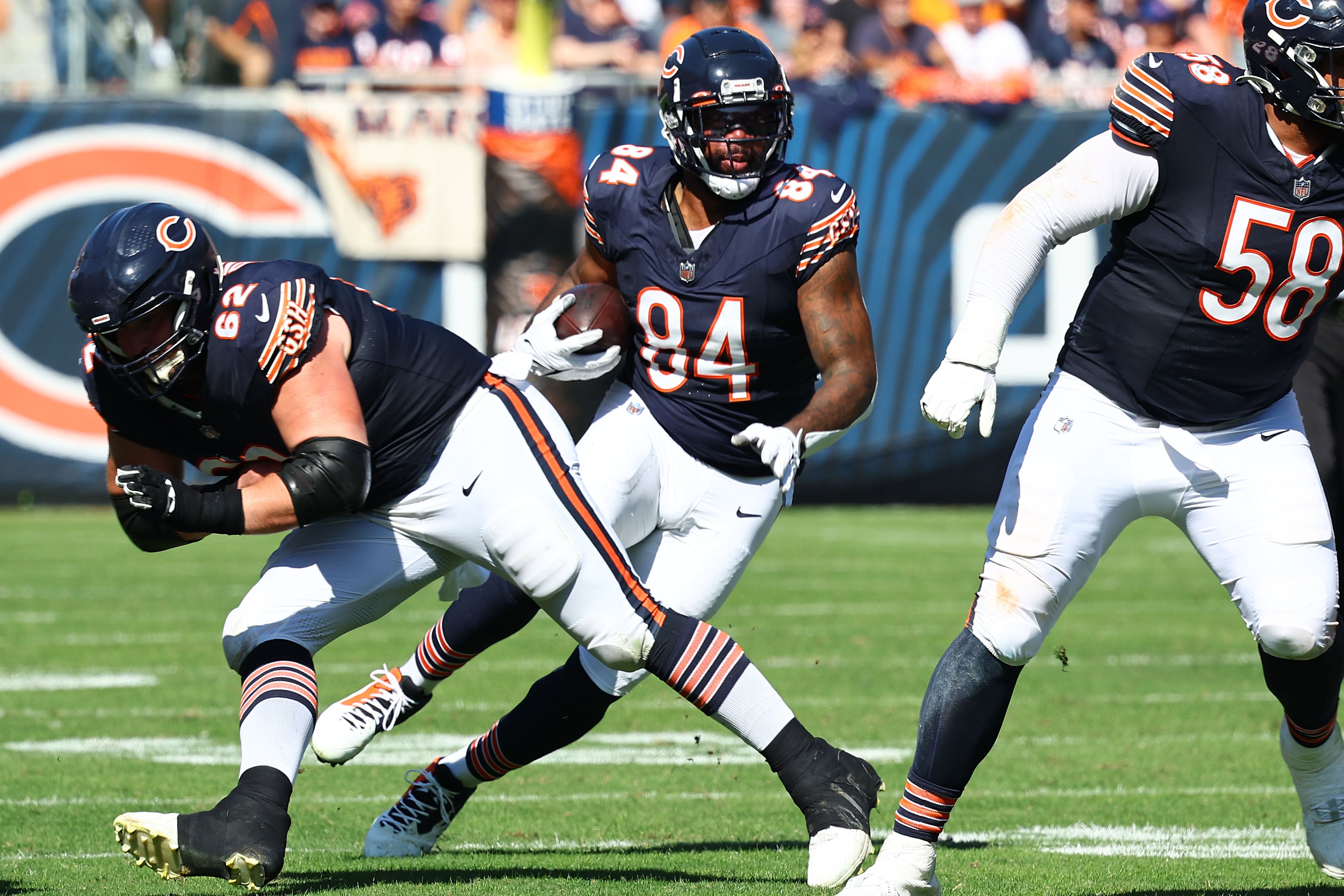 Oct 1, 2023; Chicago, Illinois, USA; Chicago Bears tight end Marcedes Lewis (84) makes a catch against the Denver Broncos during the second half at Soldier Field.