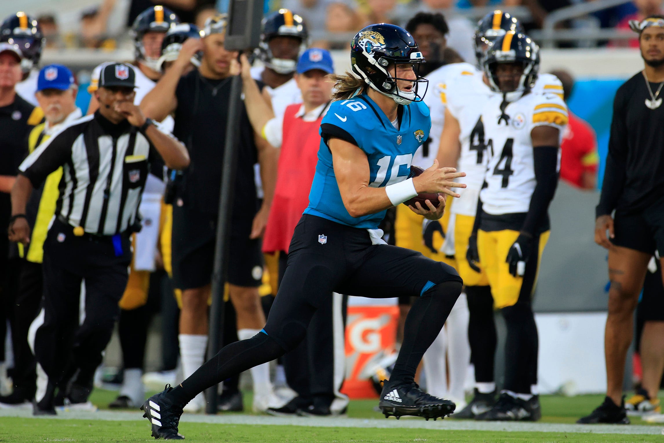 Jacksonville Jaguars quarterback Trevor Lawrence #16 runs out of bounds during the first quarter of an NFL preseason game Saturday, Aug. 20, 2022 at TIAA Bank Field in Jacksonville. [Corey Perrine/Florida Times-Union] Jki 082022 Jags Vs Steelers Cp 98