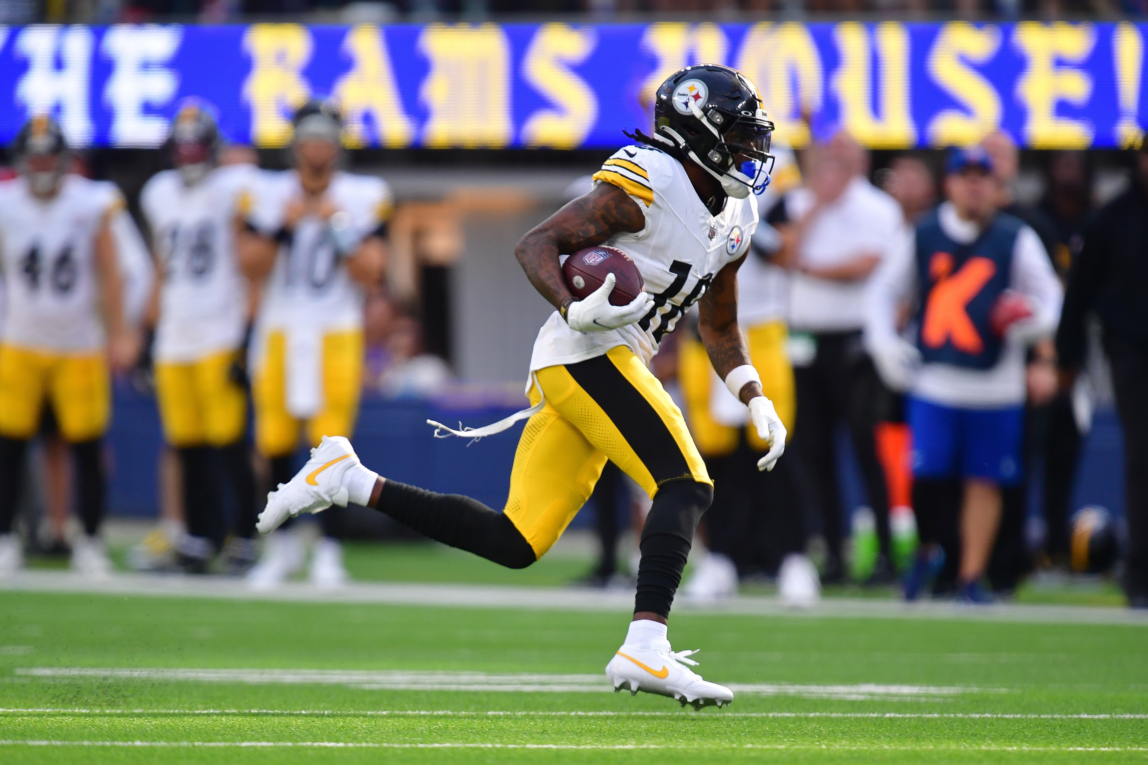 Oct 22, 2023; Inglewood, California, USA; Pittsburgh Steelers wide receiver Diontae Johnson (18) runs the ball against the Los Angeles Rams during the second half at SoFi Stadium. Mandatory Credit: Gary A. Vasquez-USA TODAY Sports