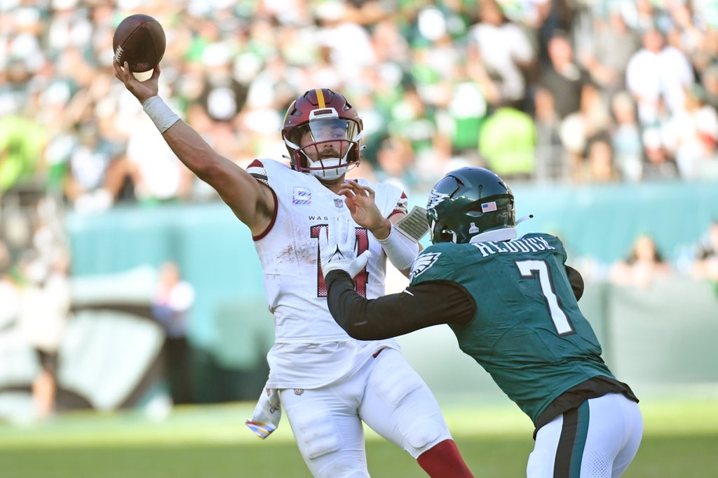 Washington QB Sam Howell pressured by Eagles LB Haason Reddick
