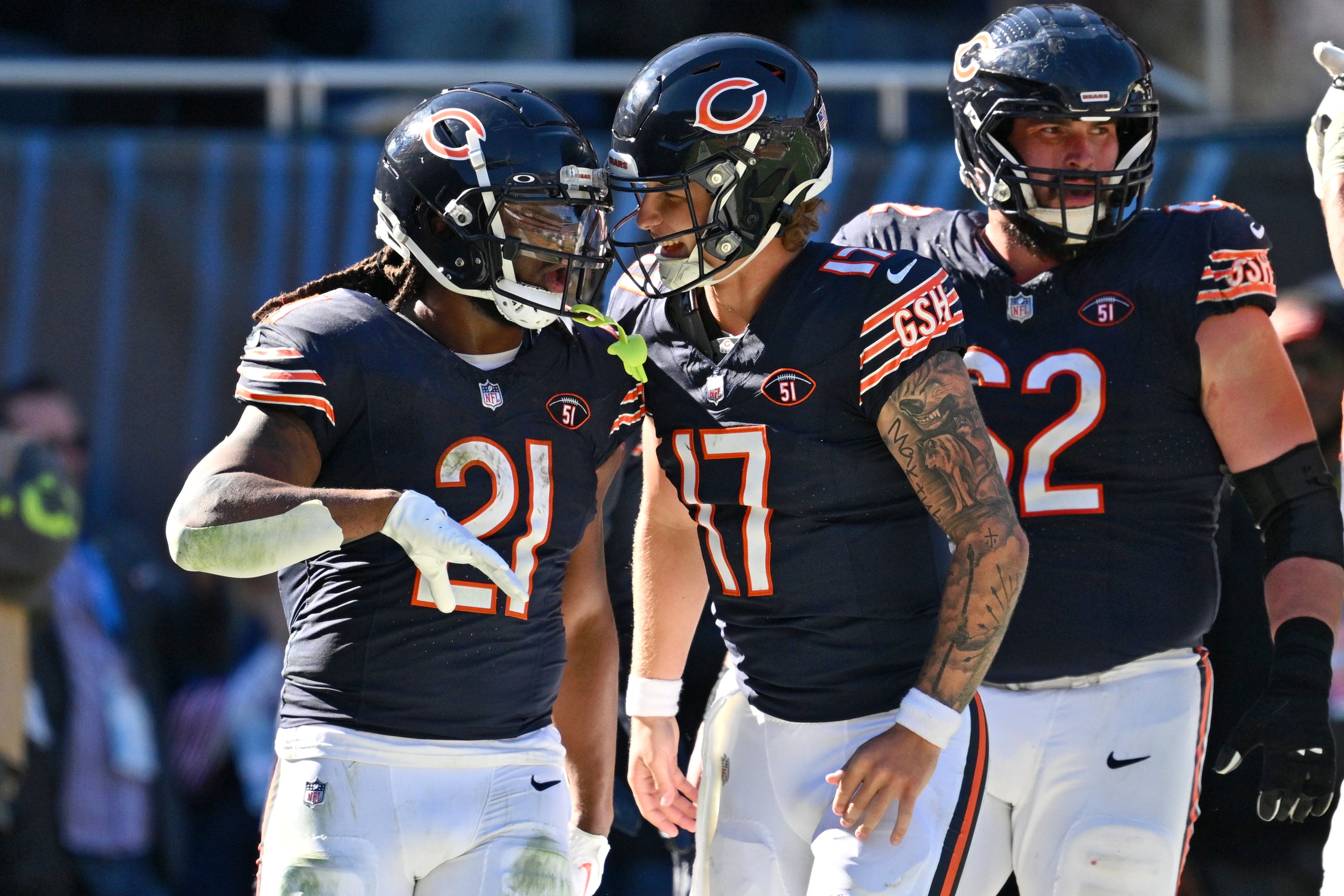 Oct 22, 2023; Chicago, Illinois, USA; Chicago Bears running back D'Onta Foreman (21) celebrates with quarterback Tyson Bagent (17) after scoring a touch down in the third quarter against the Las Vegas Raiders at Soldier Field.