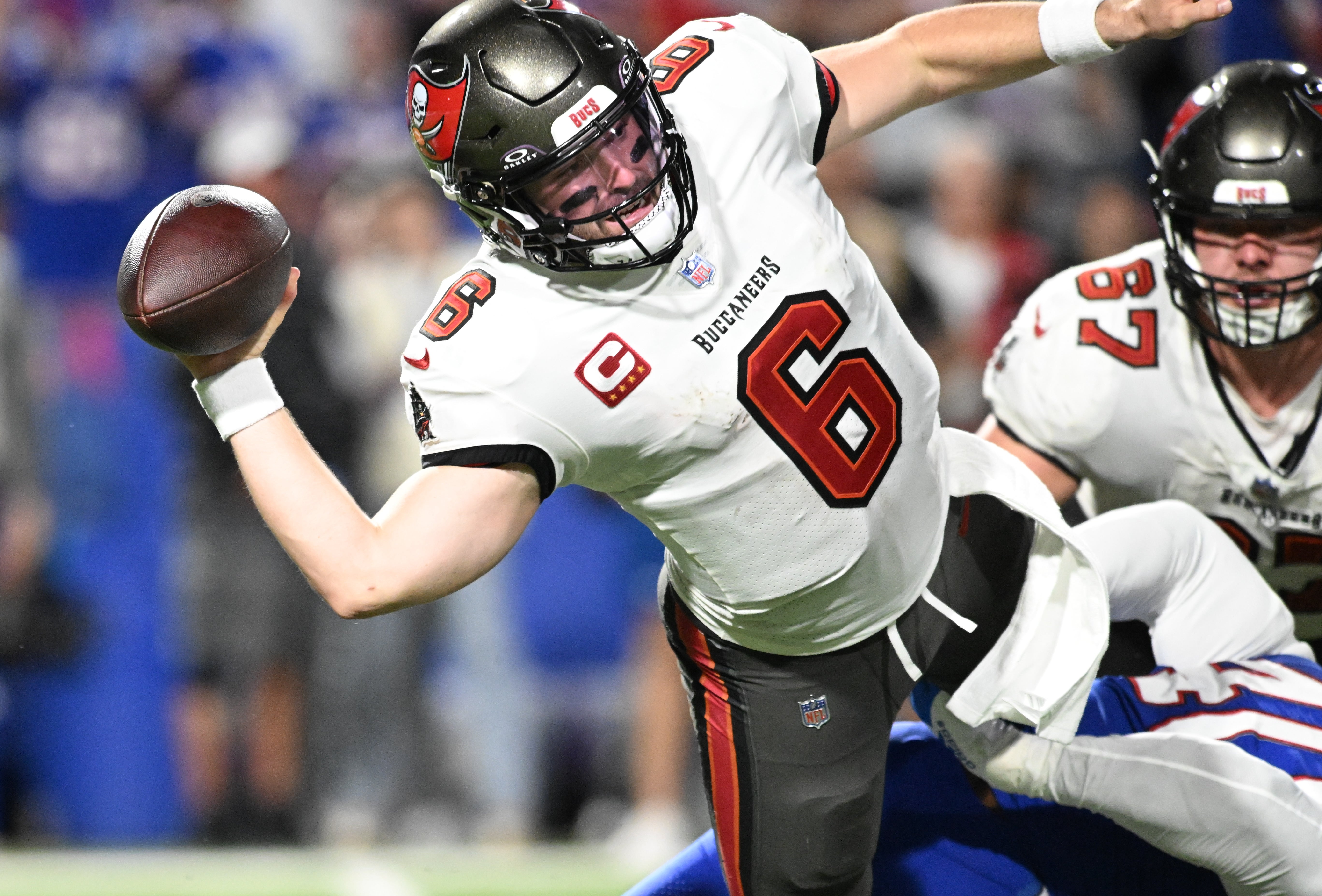 Oct 26, 2023; Orchard Park, New York, USA; Tampa Bay Buccaneers quarterback Baker Mayfield (6) throws a pass under pressure by the Buffalo Bills in the fourth quarter at Highmark Stadium. Mandatory Credit: Mark Konezny-USA TODAY Sports
