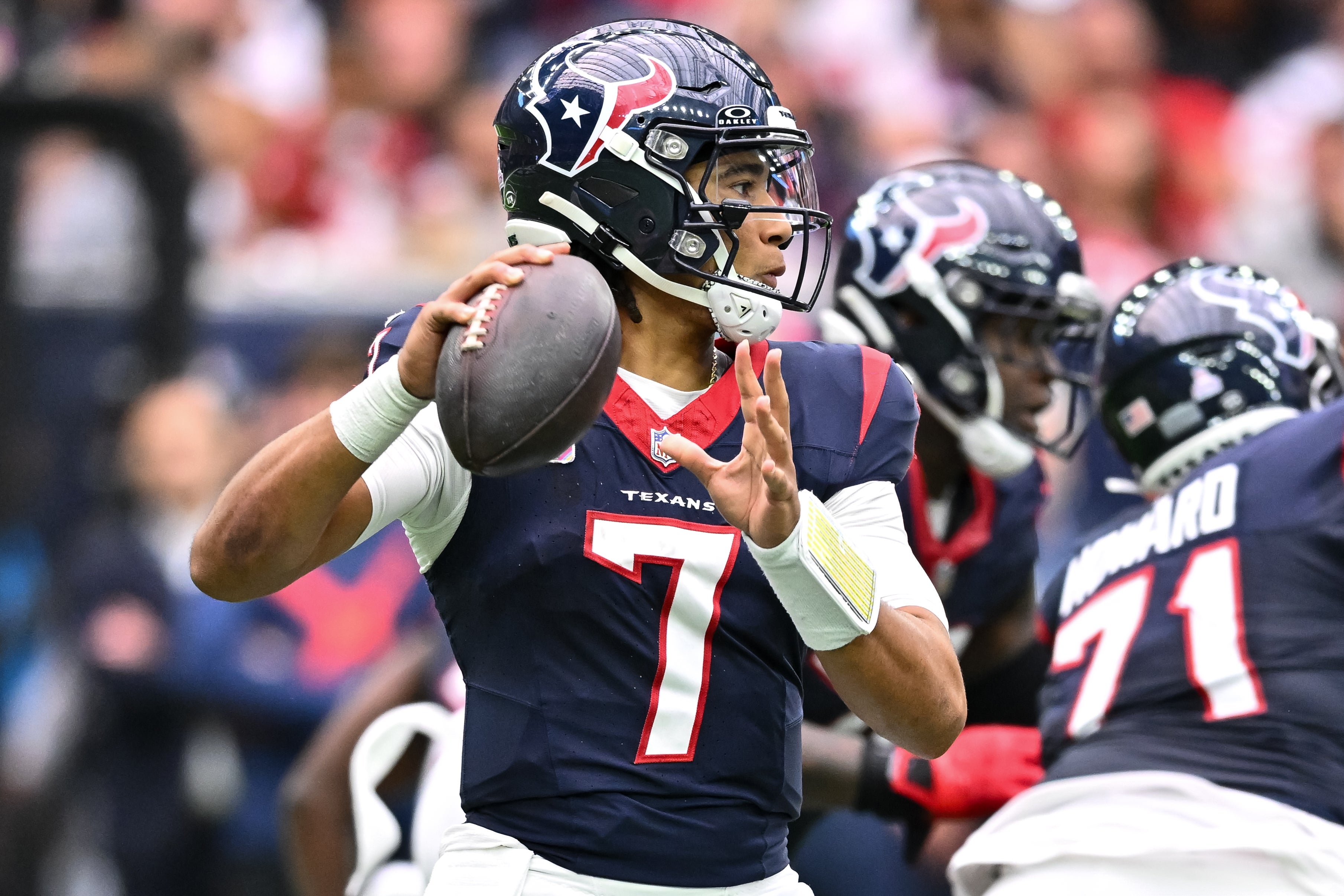 Oct 15, 2023; Houston, Texas, USA; Houston Texans quarterback C.J. Stroud (7) passes the ball during the third quarter against the New Orleans Saints at NRG Stadium.