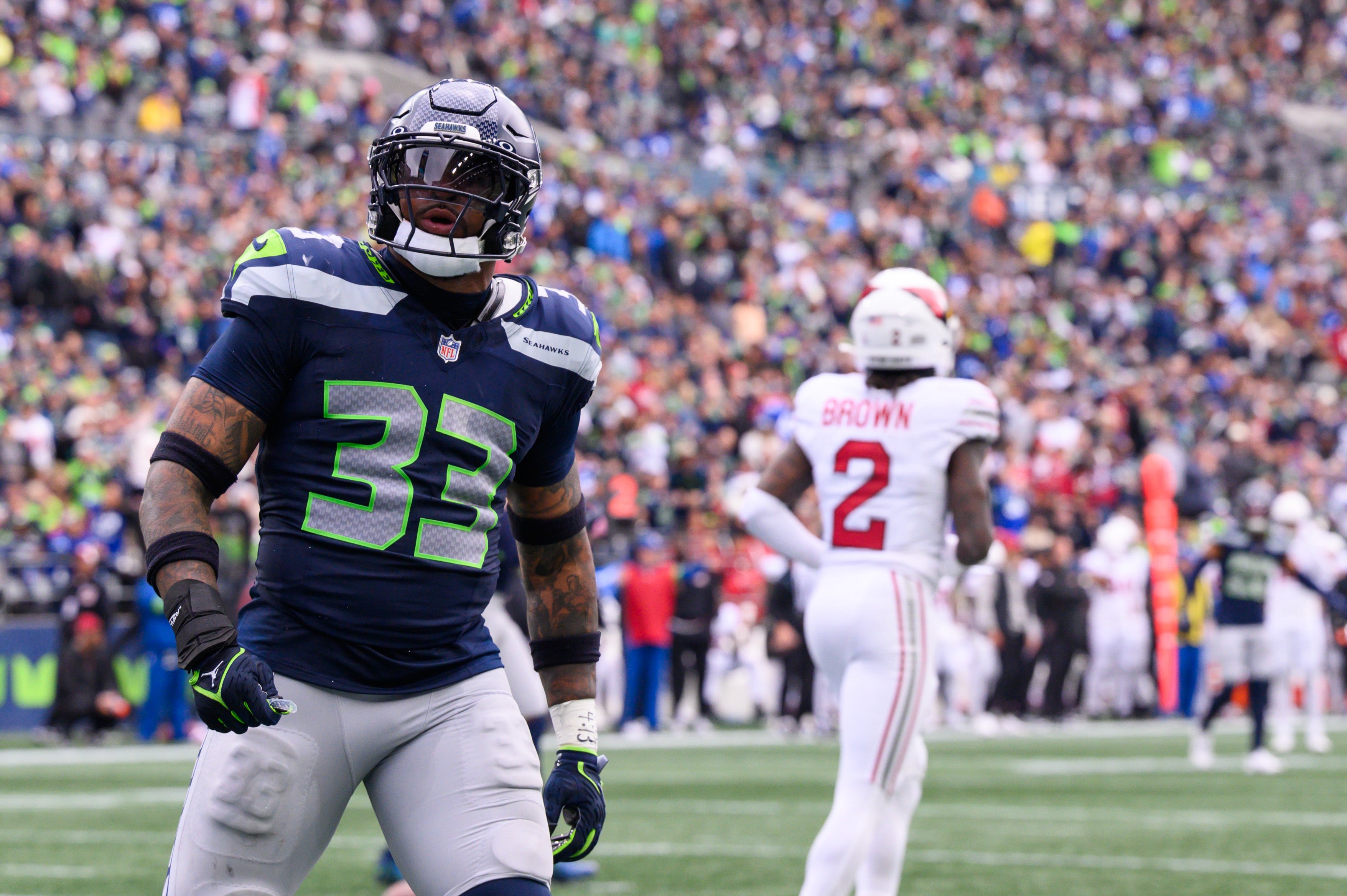 Oct 22, 2023; Seattle, Washington, USA; Seattle Seahawks safety Jamal Adams (33) celebrates after making a play against the Arizona Cardinals during the game at Lumen Field. Mandatory Credit: Steven Bisig-USA TODAY Sports