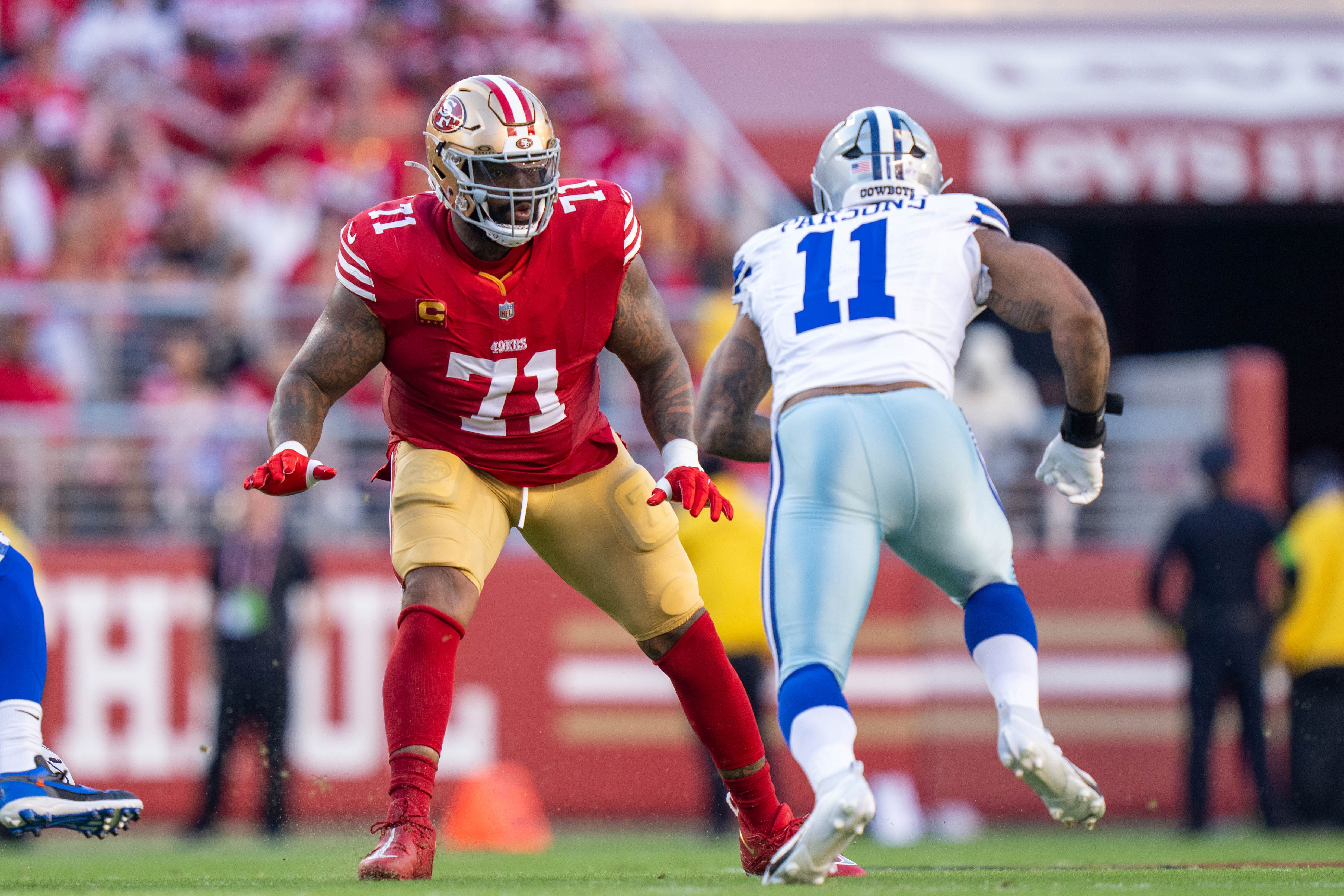October 8, 2023; Santa Clara, California, USA; San Francisco 49ers offensive tackle Trent Williams (71) blocks Dallas Cowboys linebacker Micah Parsons (11) during the first quarter at Levi's Stadium.